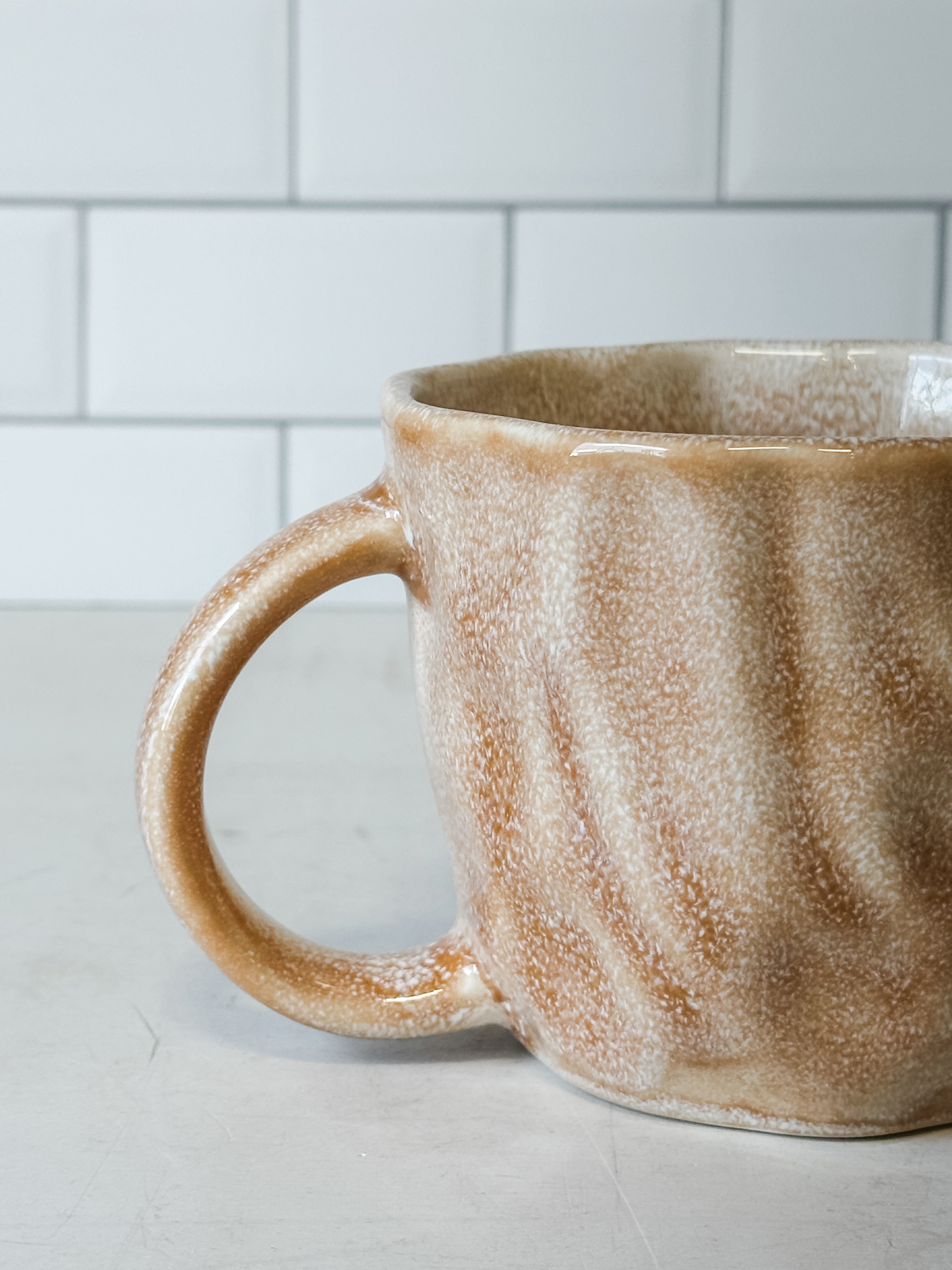 12 ounce handcrafted apricot color mugs at the rustic barn in killingworth ct