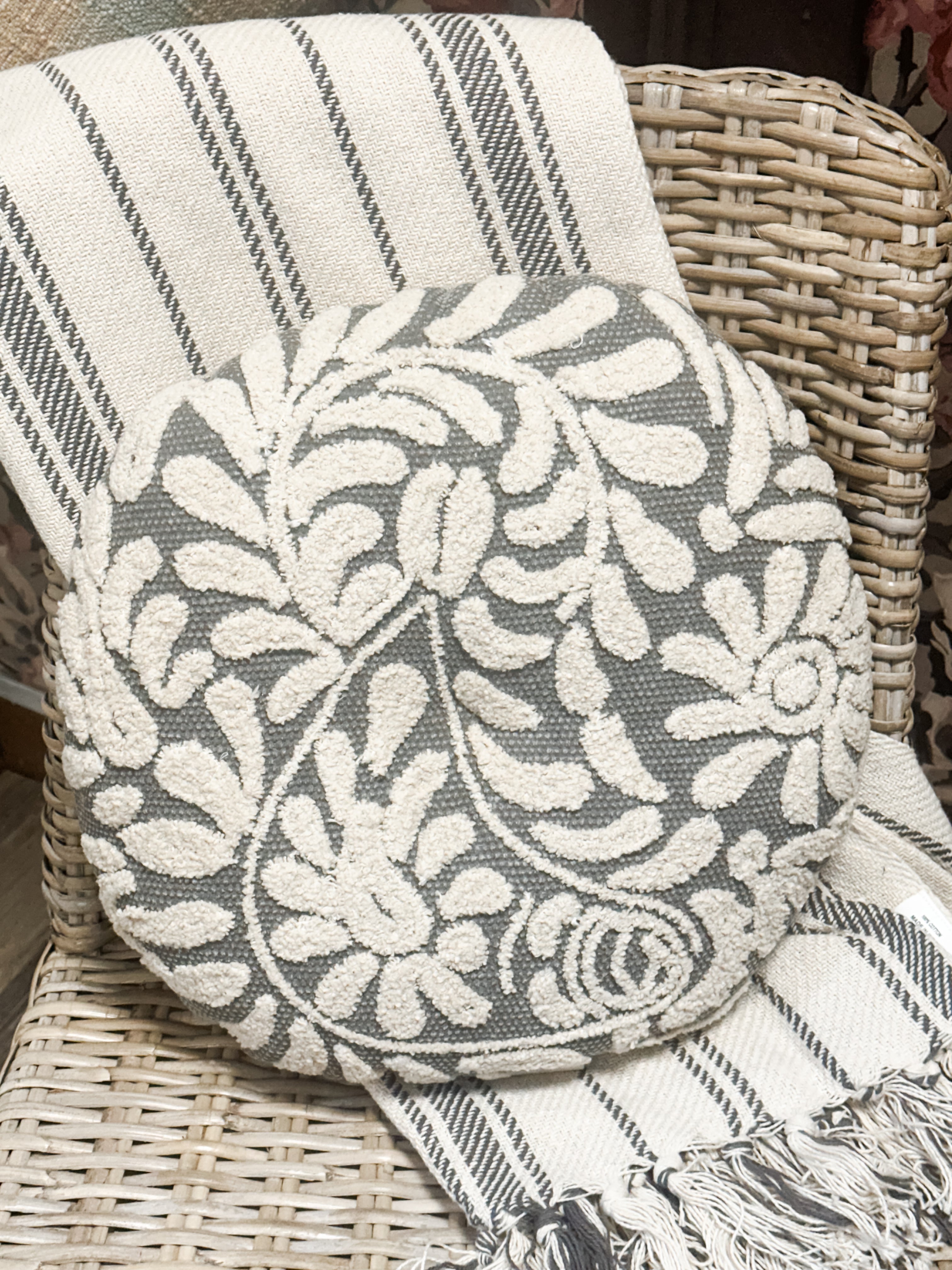 16" Wildflower Grey Hand-Embroidered Round Decorative Pillow at the Rustic Barn in Killingworth, CT