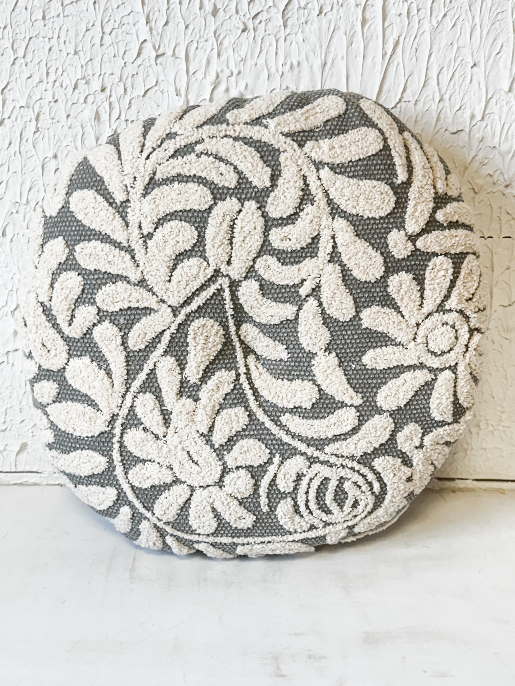 16" Wildflower Grey Hand-Embroidered Round Decorative Pillow at the Rustic Barn in Killingworth, CT