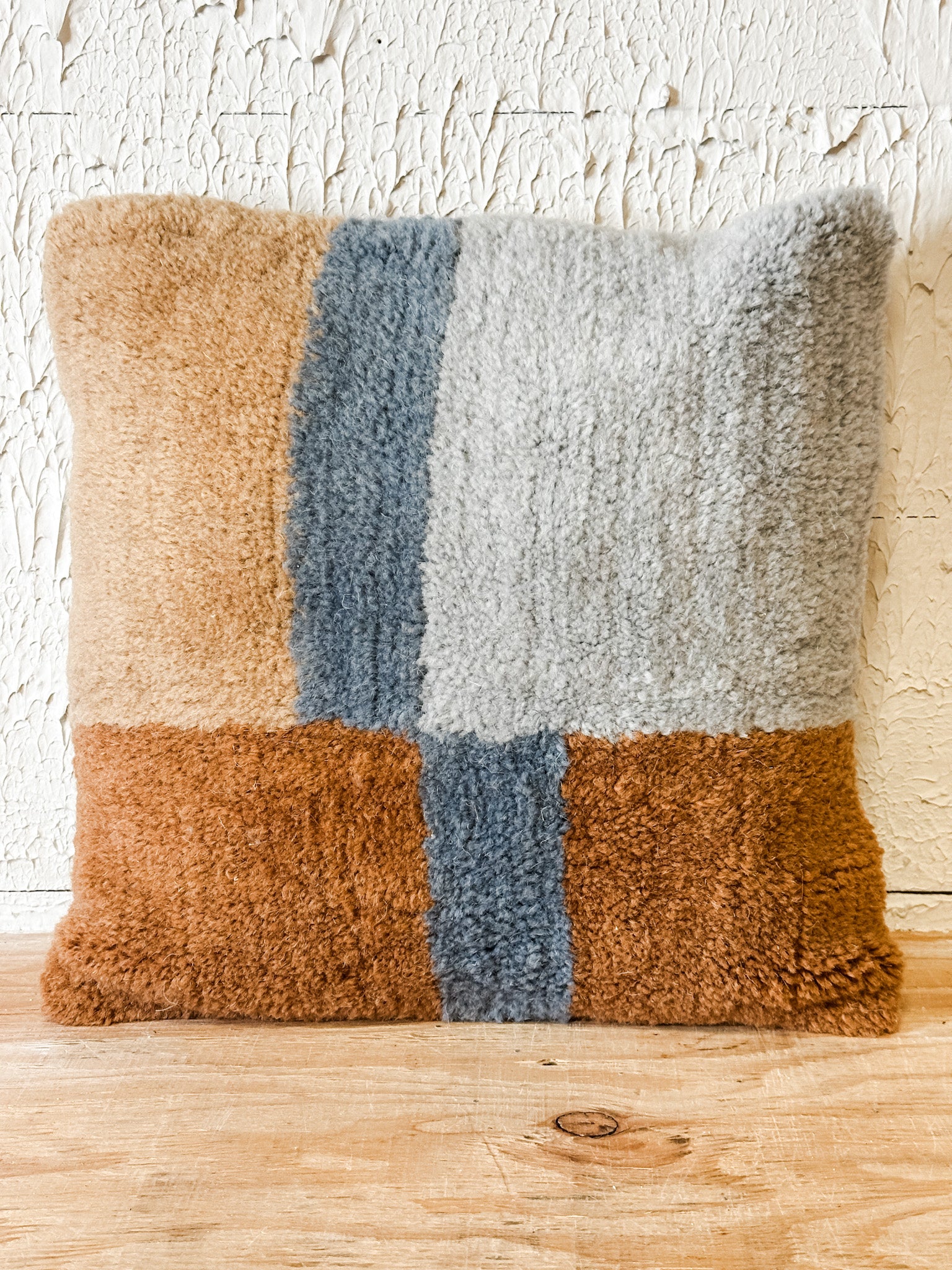 18 inch brown tan and blue tufted new zealand wool and cotton pillow at the rustic barn in killingworth ct