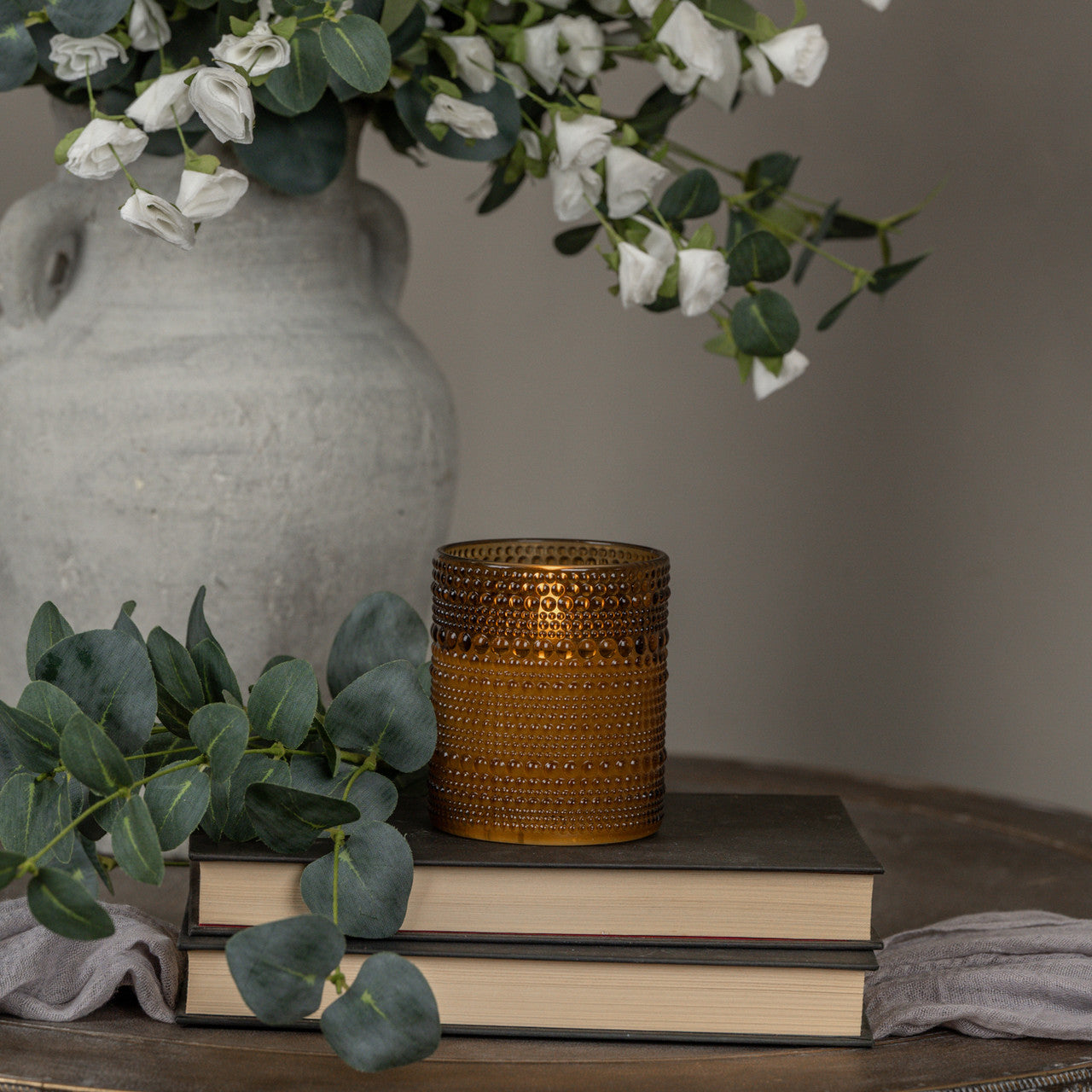 amber dotted glass faux flame candle at the rustic barn in Killingworth ct