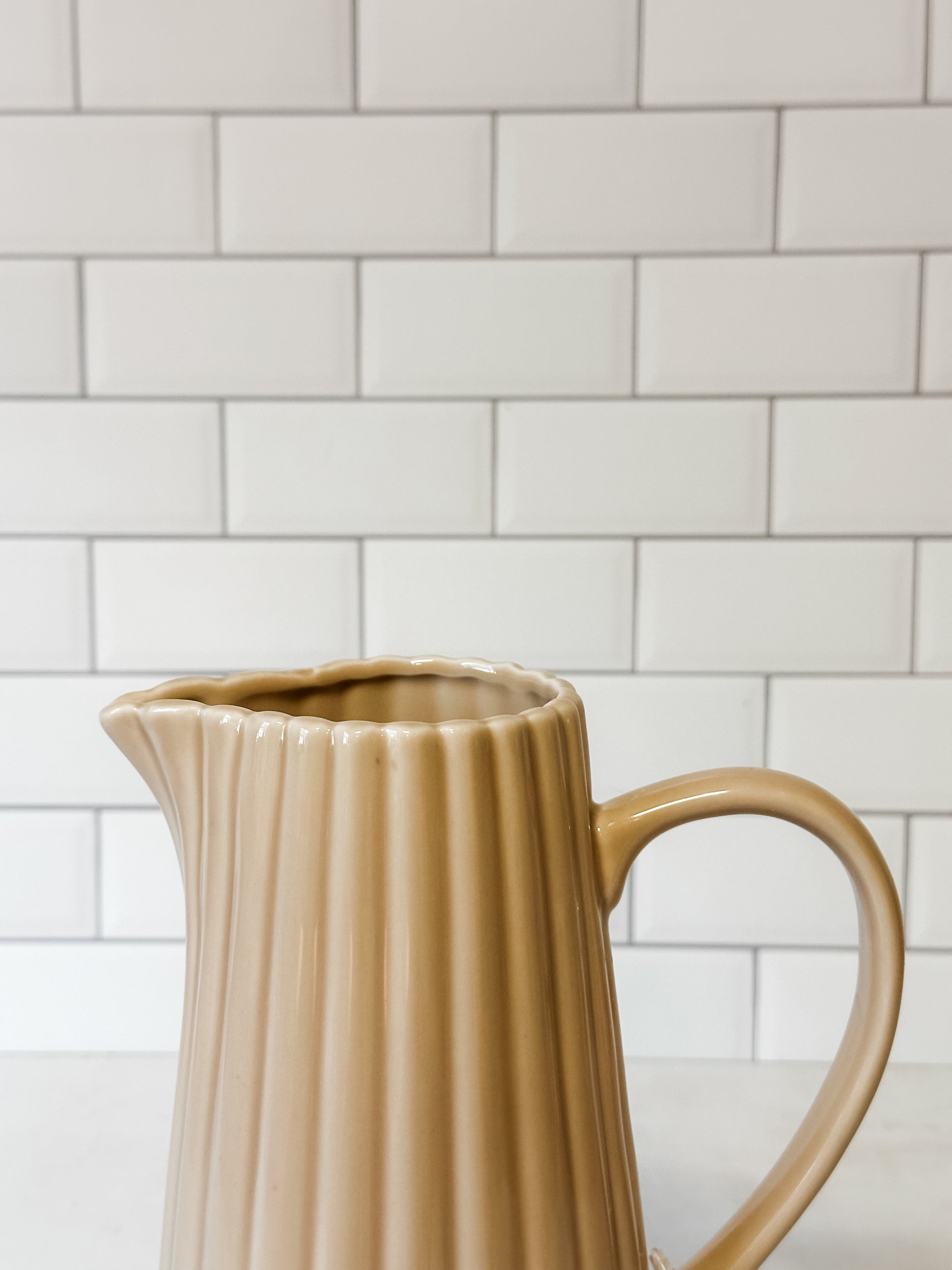 40 ounce stoneware ribbed pitcher cream color at the Rustic Barn in Killingworth CT