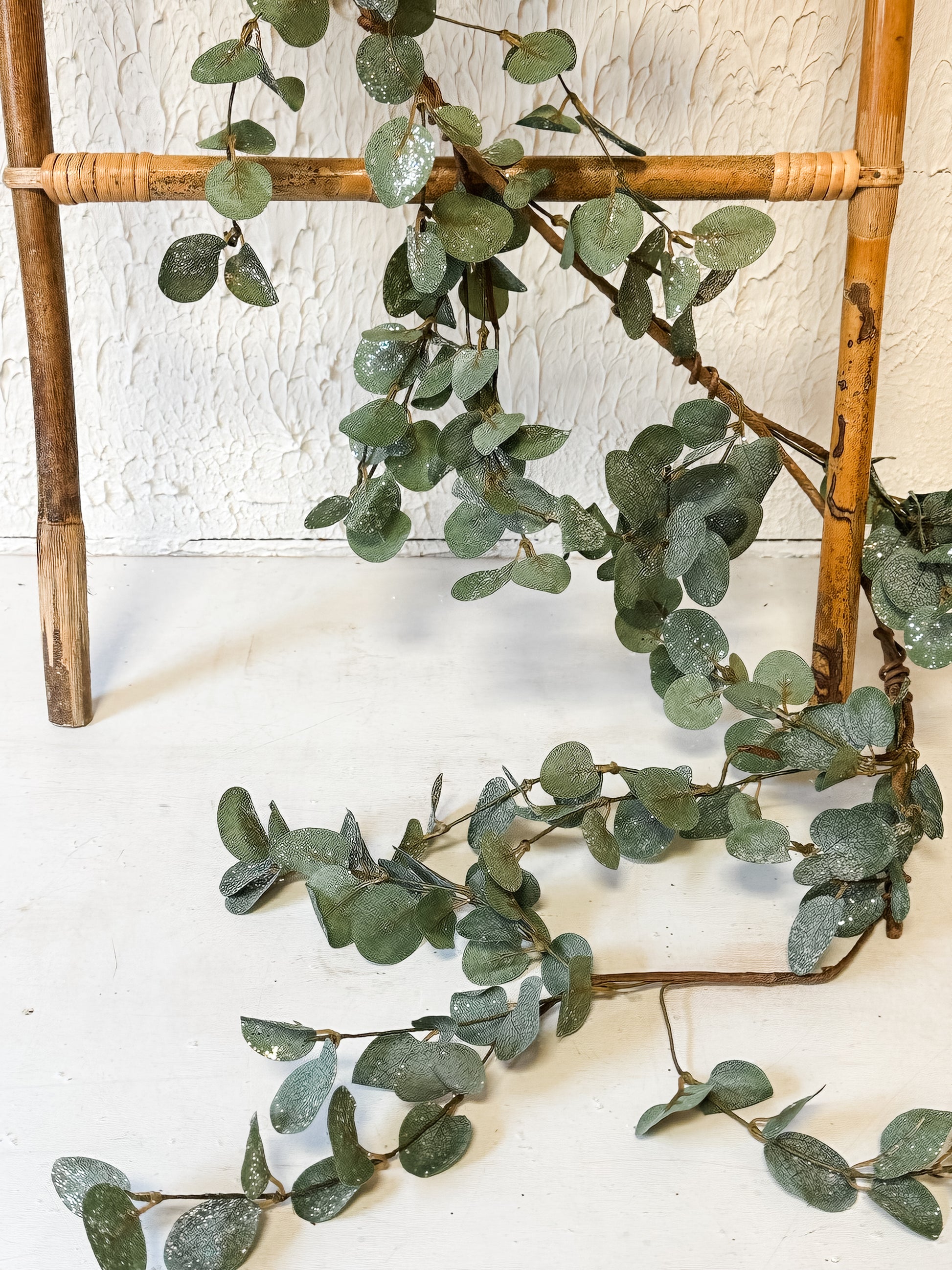 6 foot faux green eucalyptus garland with glitter at The Rustic Barn in Killingworth CT