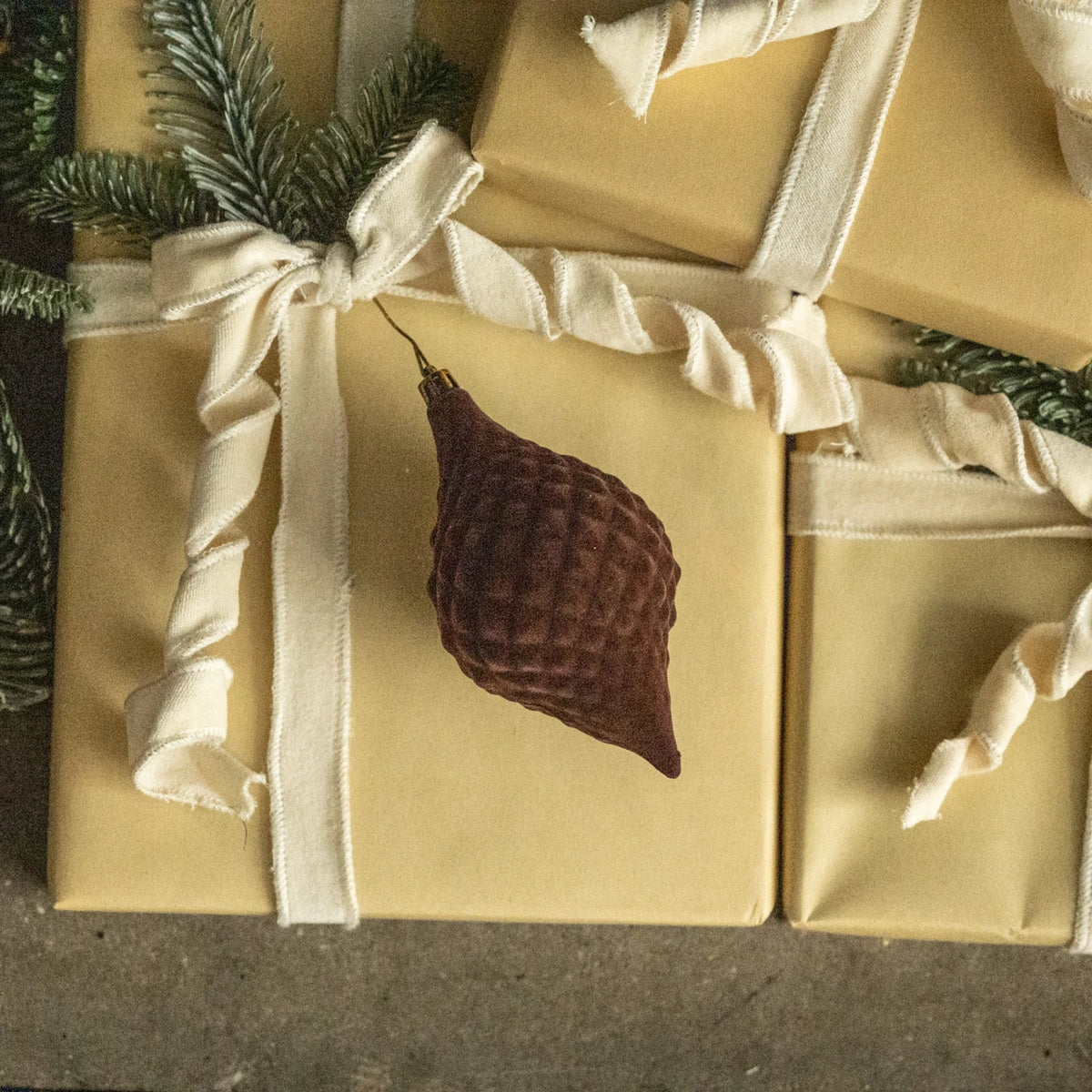 6 inch dark brown flocked finial ornament at the rustic barn in killingworth ct