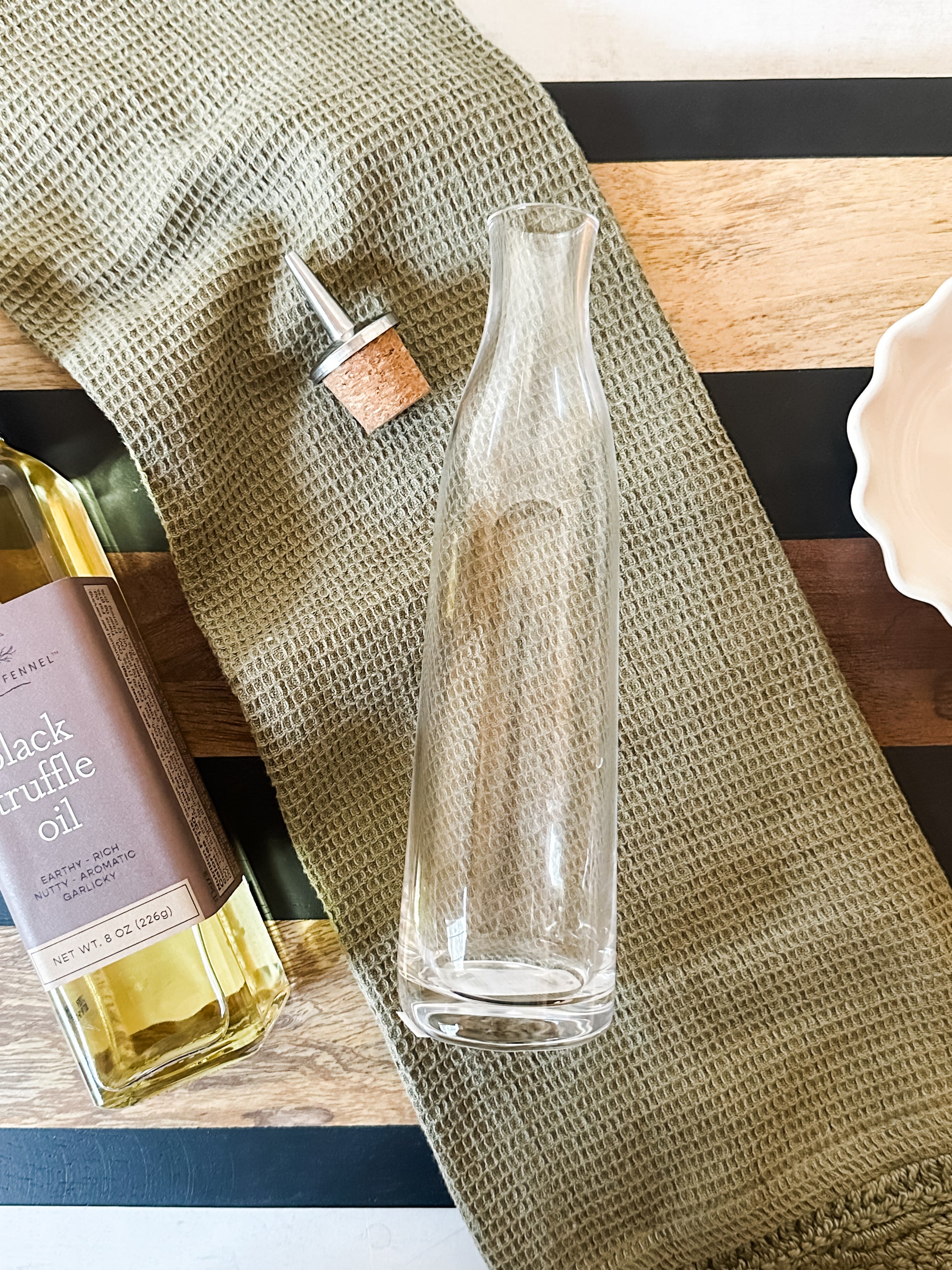 8 ounce glass cruet with stainless steel cork spout at the Rustic Barn in Killingworth CT