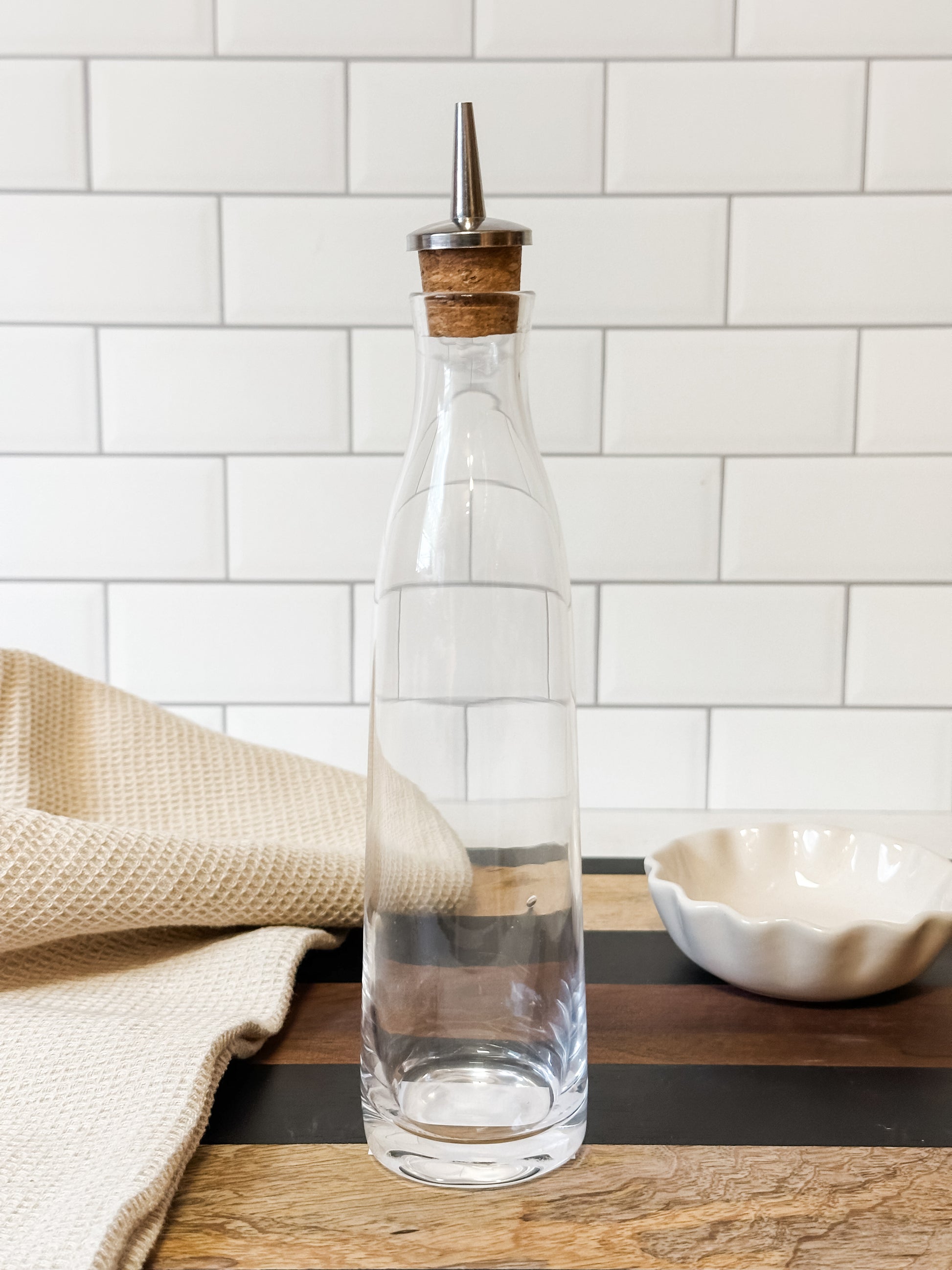 8 ounce glass cruet with stainless steel cork spout at the Rustic Barn in Killingworth CT