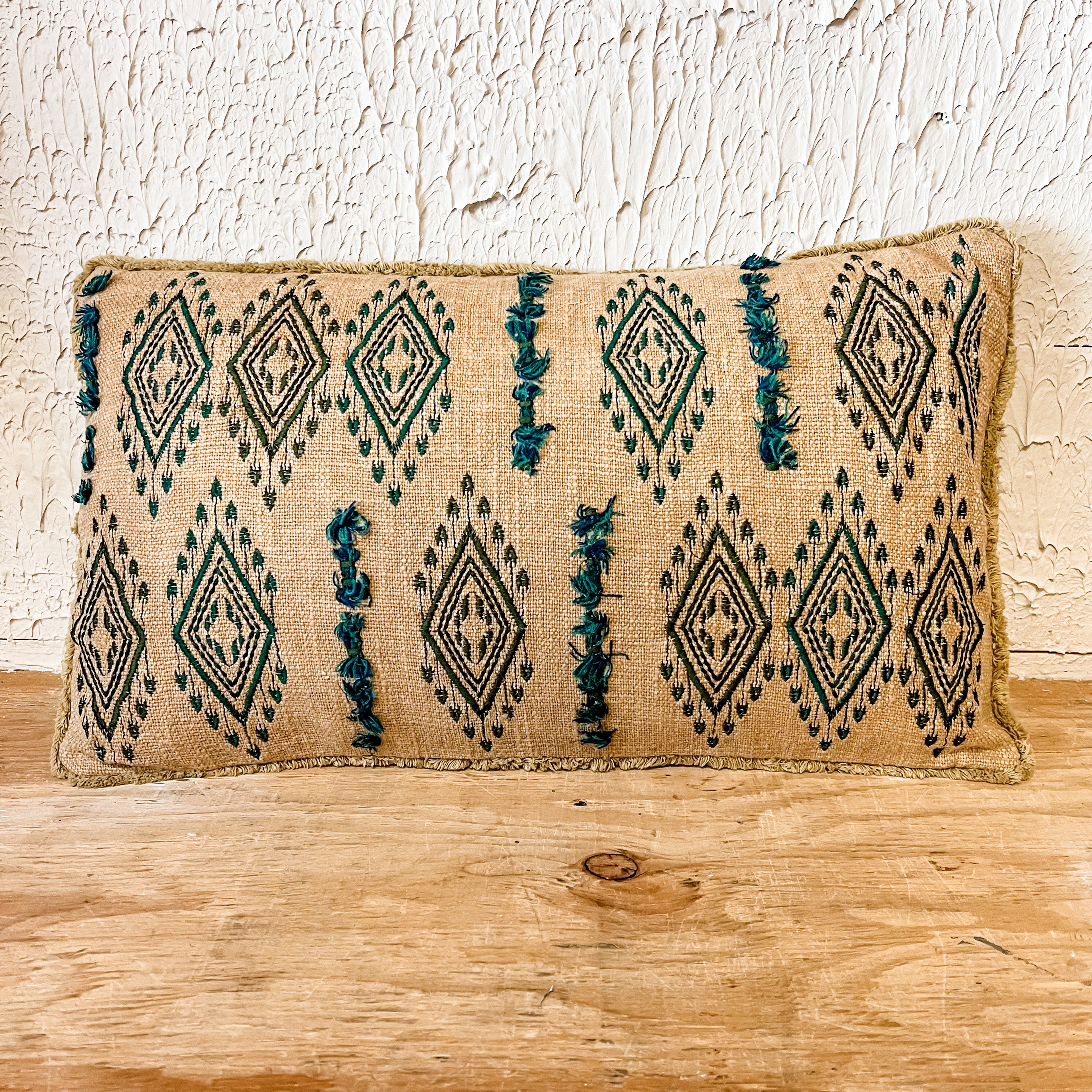 cotton lumbar natural and teal embroidered pillow the Rustic barn ct