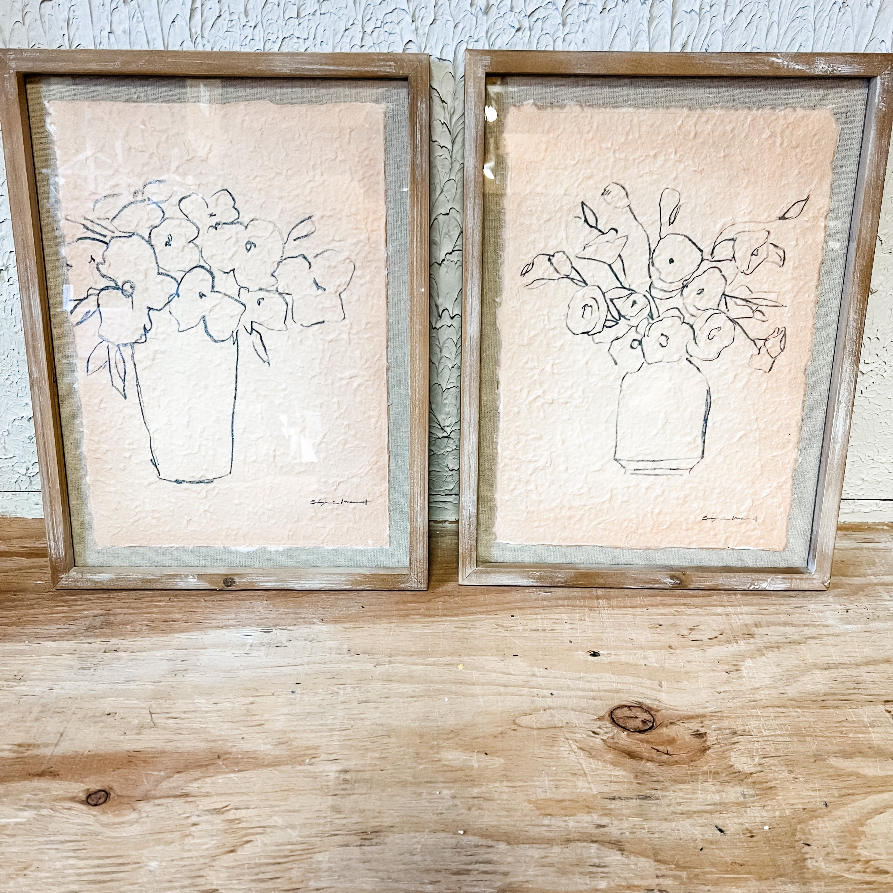 Sketched vase art work in distressed paper and framed the rustic barn ct