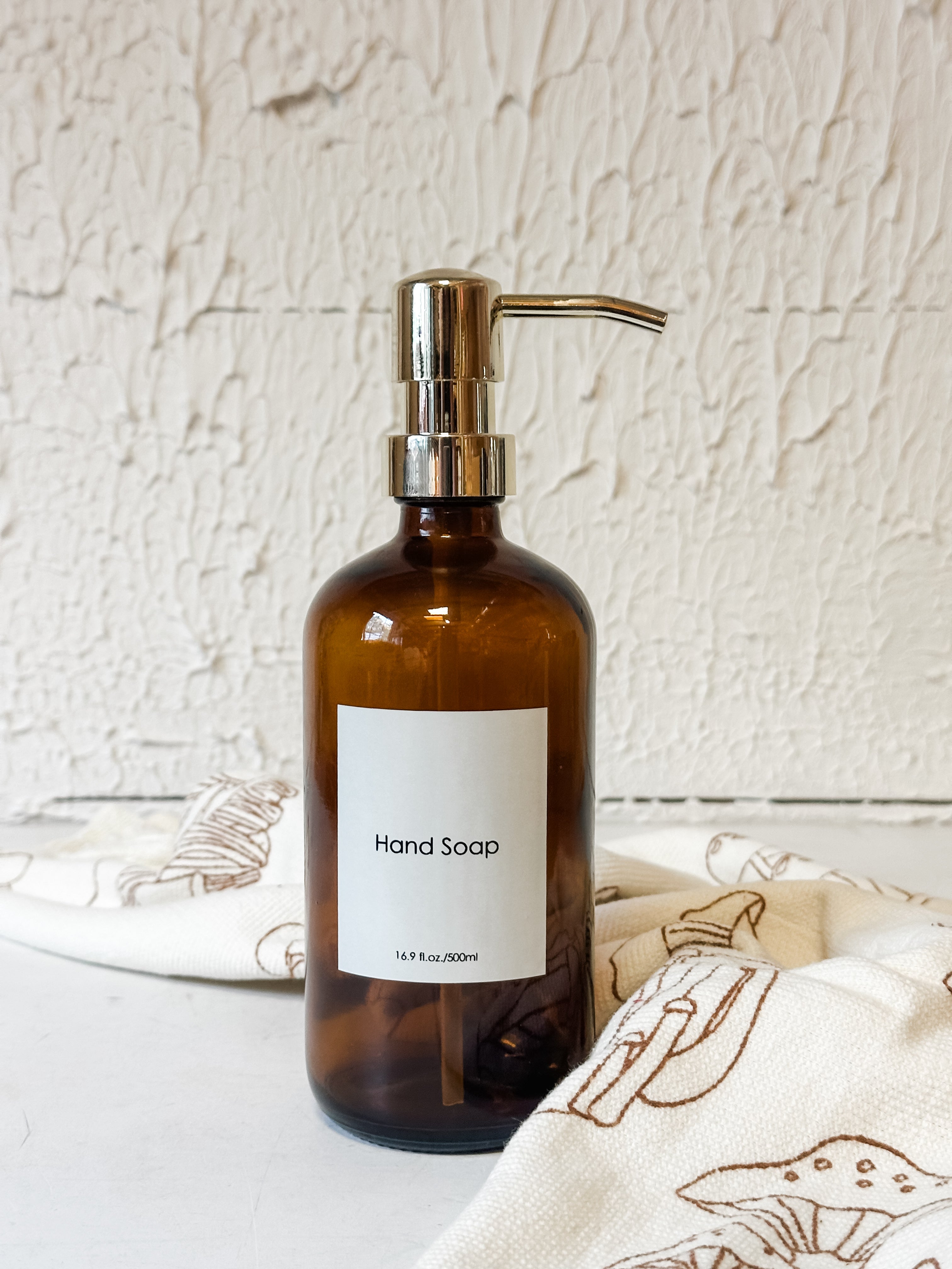 hand soap pump in amber color container at The Rustic Barn in Killingworth CT