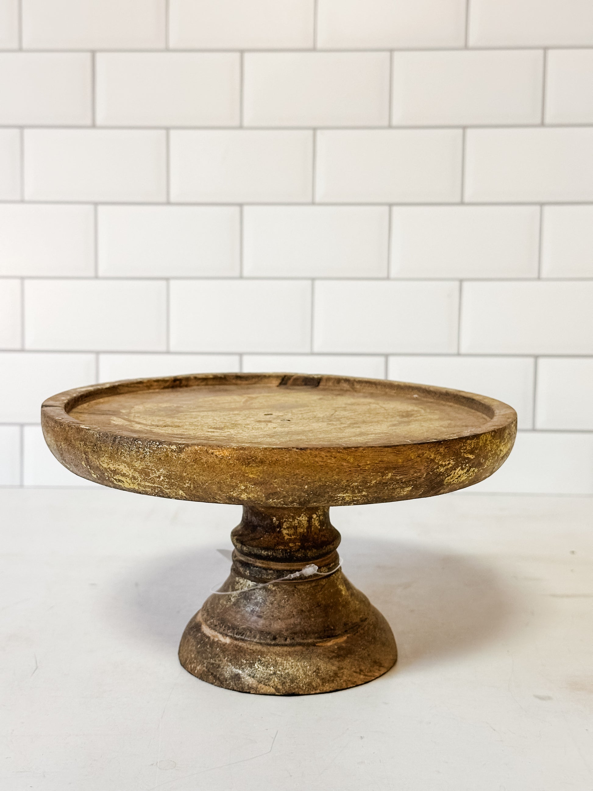 antique gold round wood cake stand at The Rustic Barn in Killingworth CT