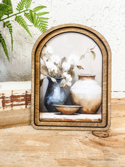 arch top framed small still life artwork at the rustic barn in killingworth ct