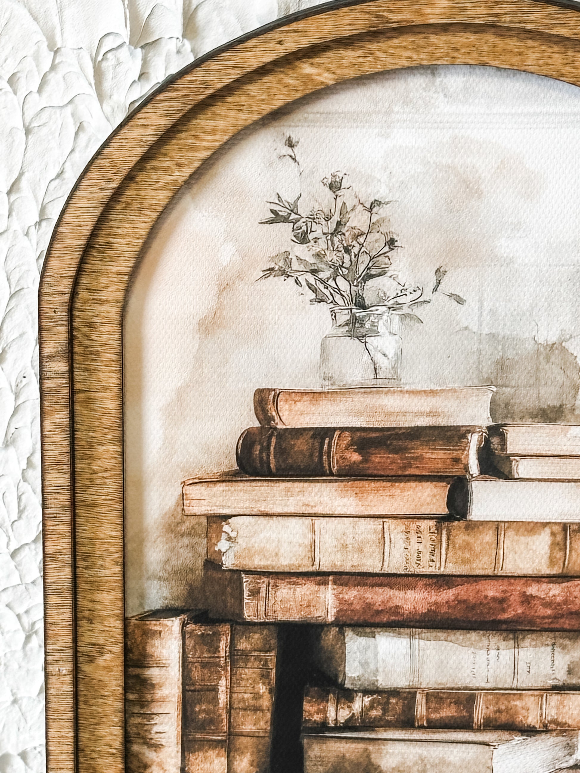 Arch Top Stacked Books Framed Wall Art at the Rustic Barn in Killingworth, CT