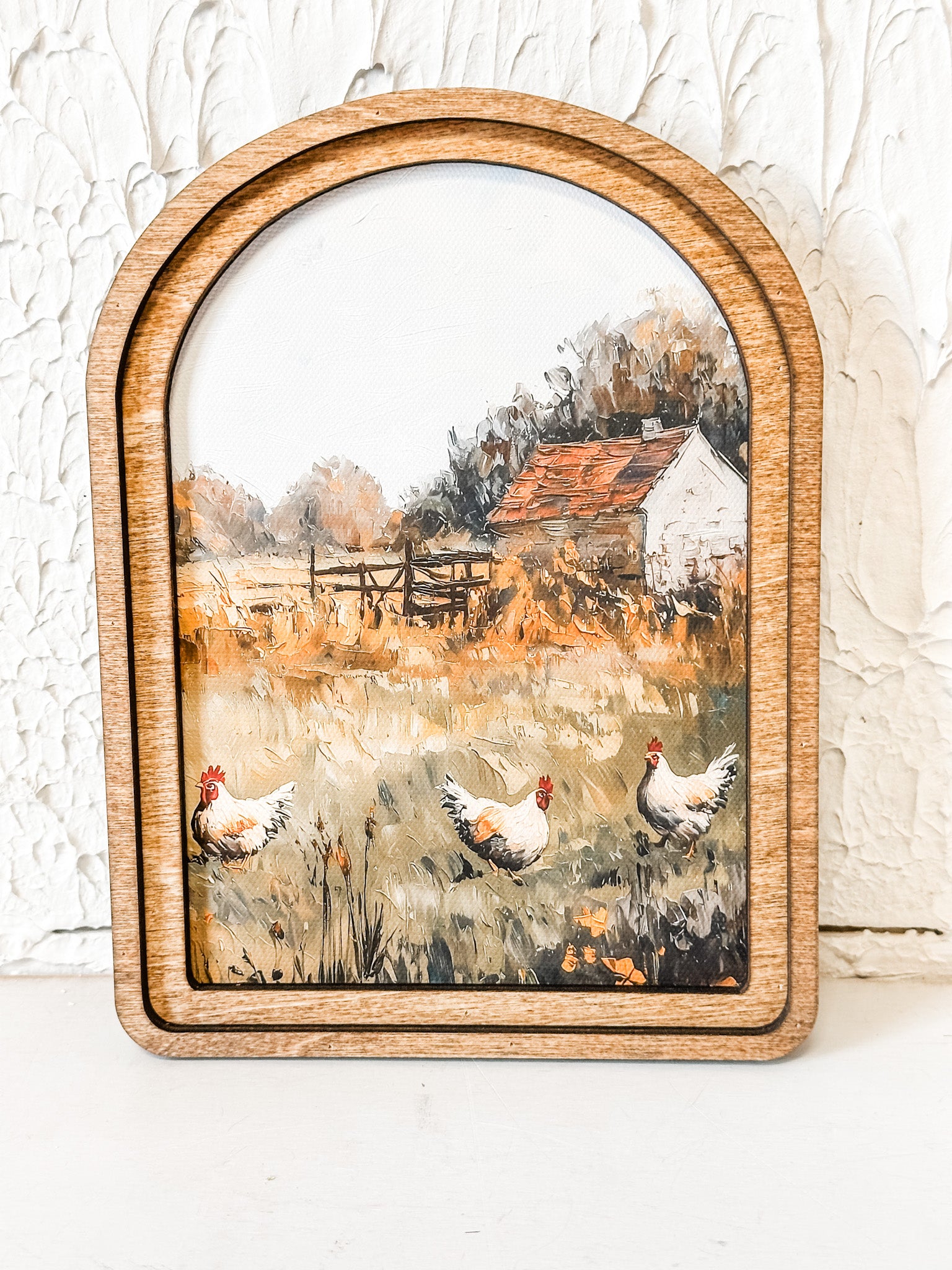 arched framed chicken and barn wall decor at the rustic barn in killingworth ct