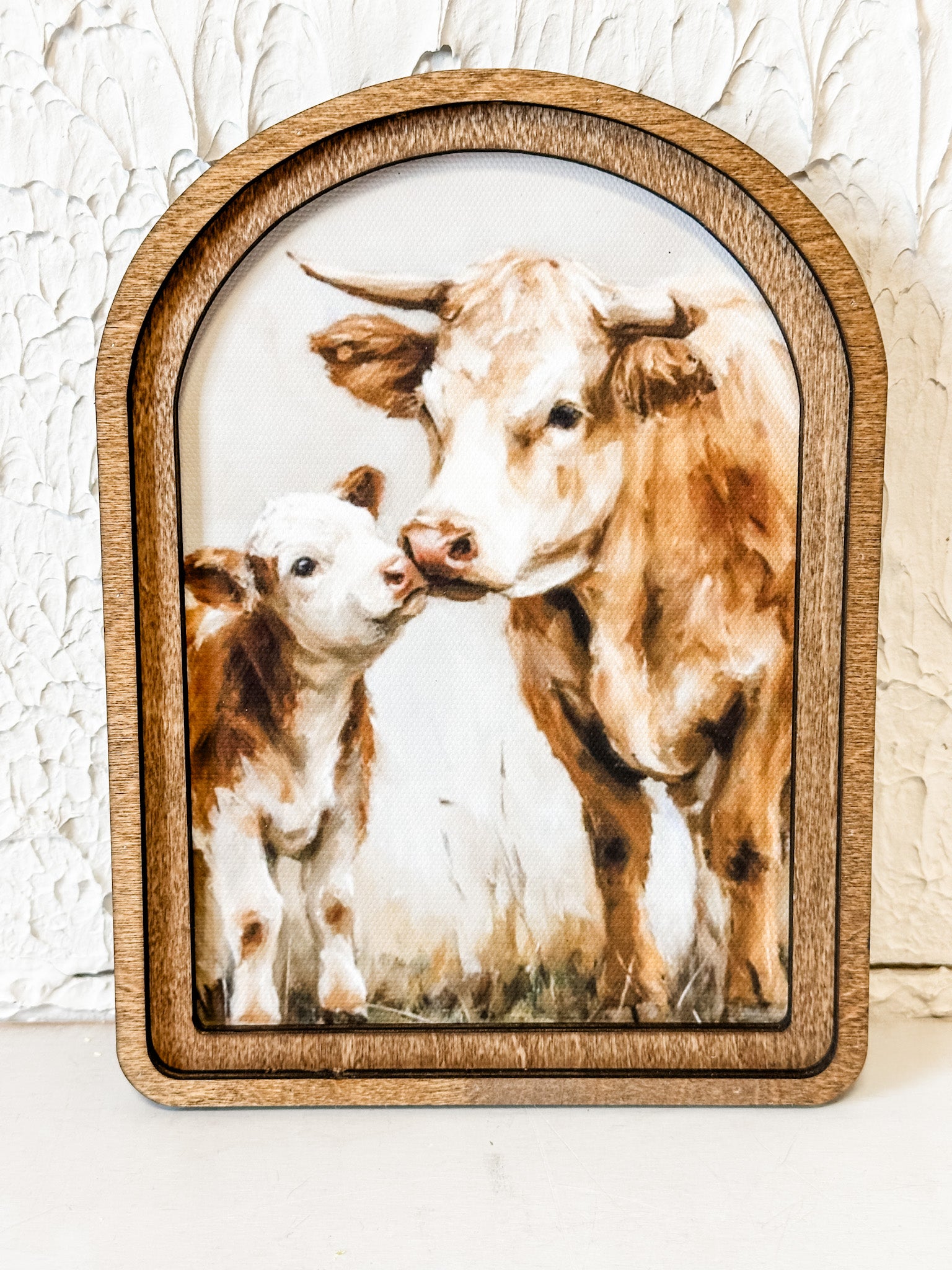 arched framed wall art mama cow and calf at the rustic barn in killingworth ct