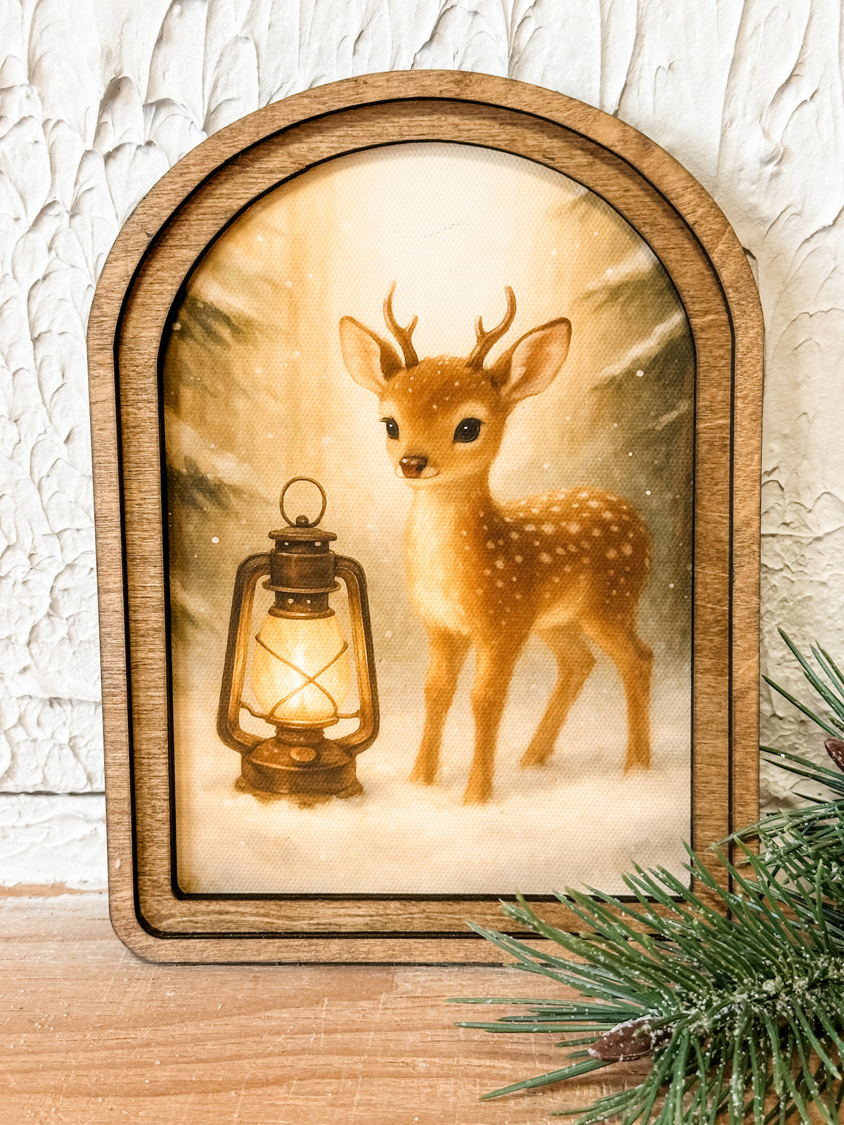 rustic arched framed print with vintage deer and lantern at the rustic barn in killingworth ct