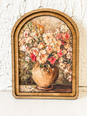 rustic vase with pink red and orange flowers wall decor at the rustic barn in killingworth ct