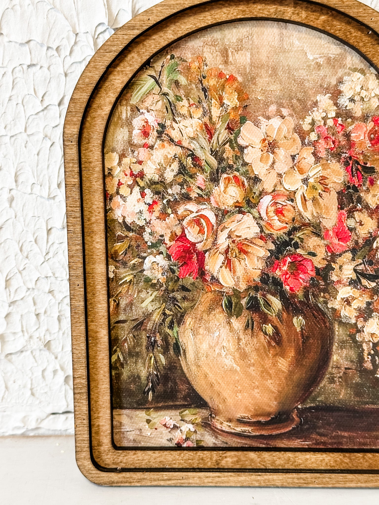 rustic vase with pink red and orange flowers wall decor at the rustic barn in killingworth ct