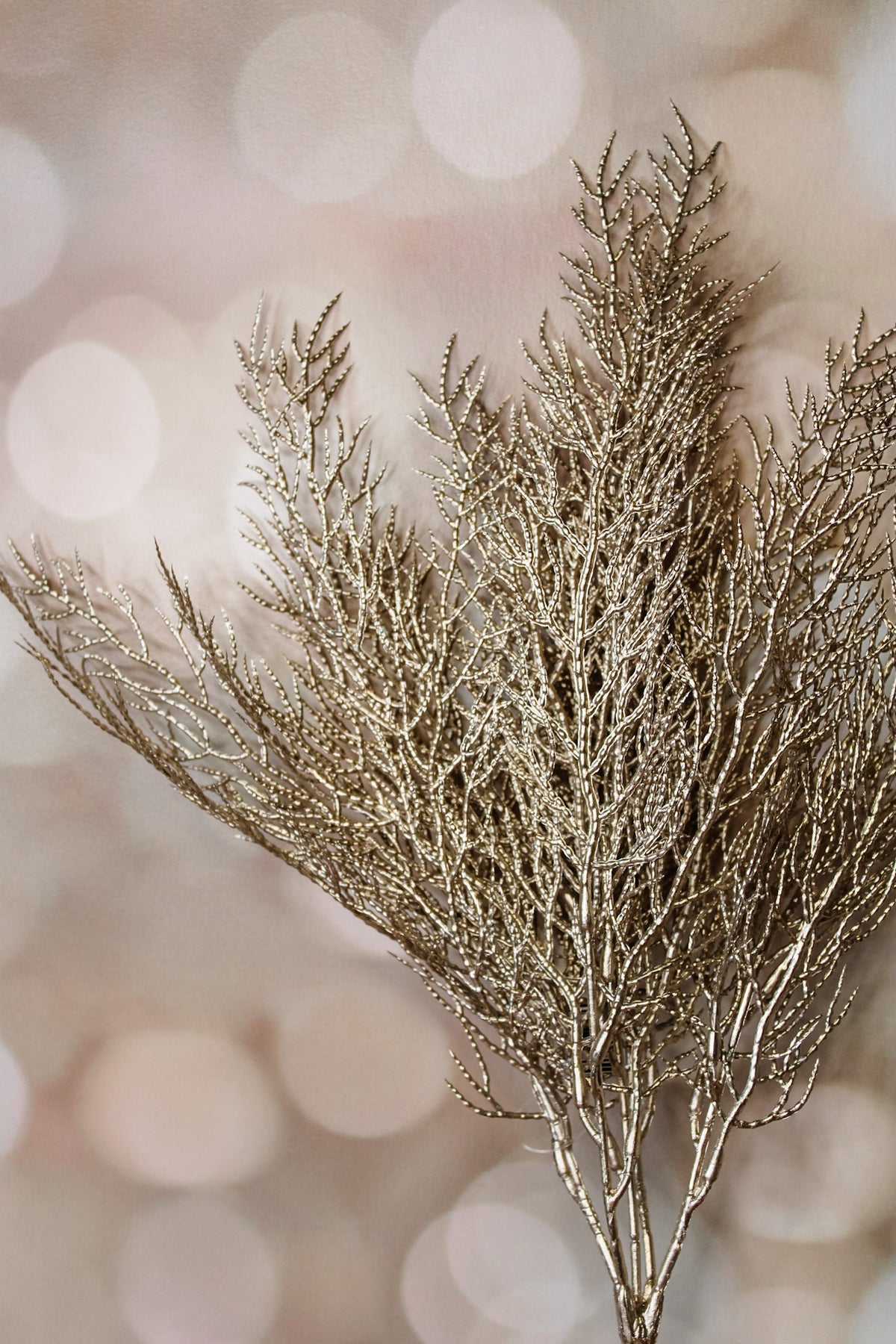Artificial golden shiny shimmery christmas bush floral for the holidays for sale at the rustic barn in Killingworth, CT