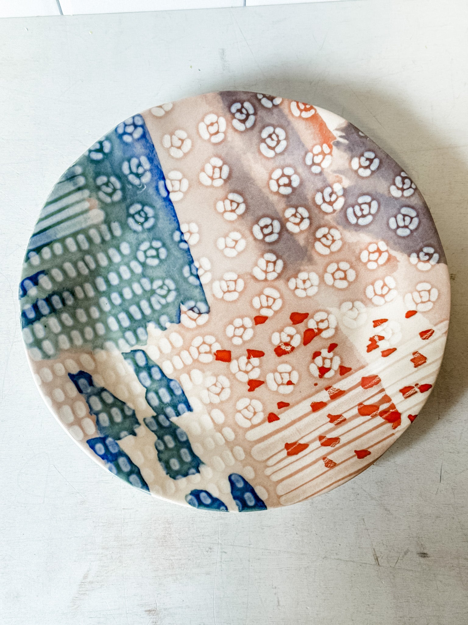 artisan abstract print stoneware plate at the rustic barn in killingworth ct