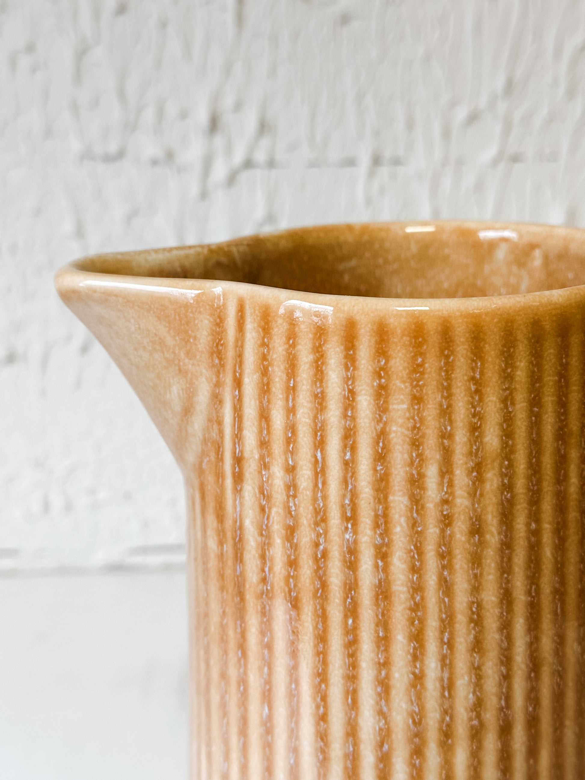 Artisan Apricot Ribbed Stoneware Pitcher at the Rustic Barn in Killingworth, CT