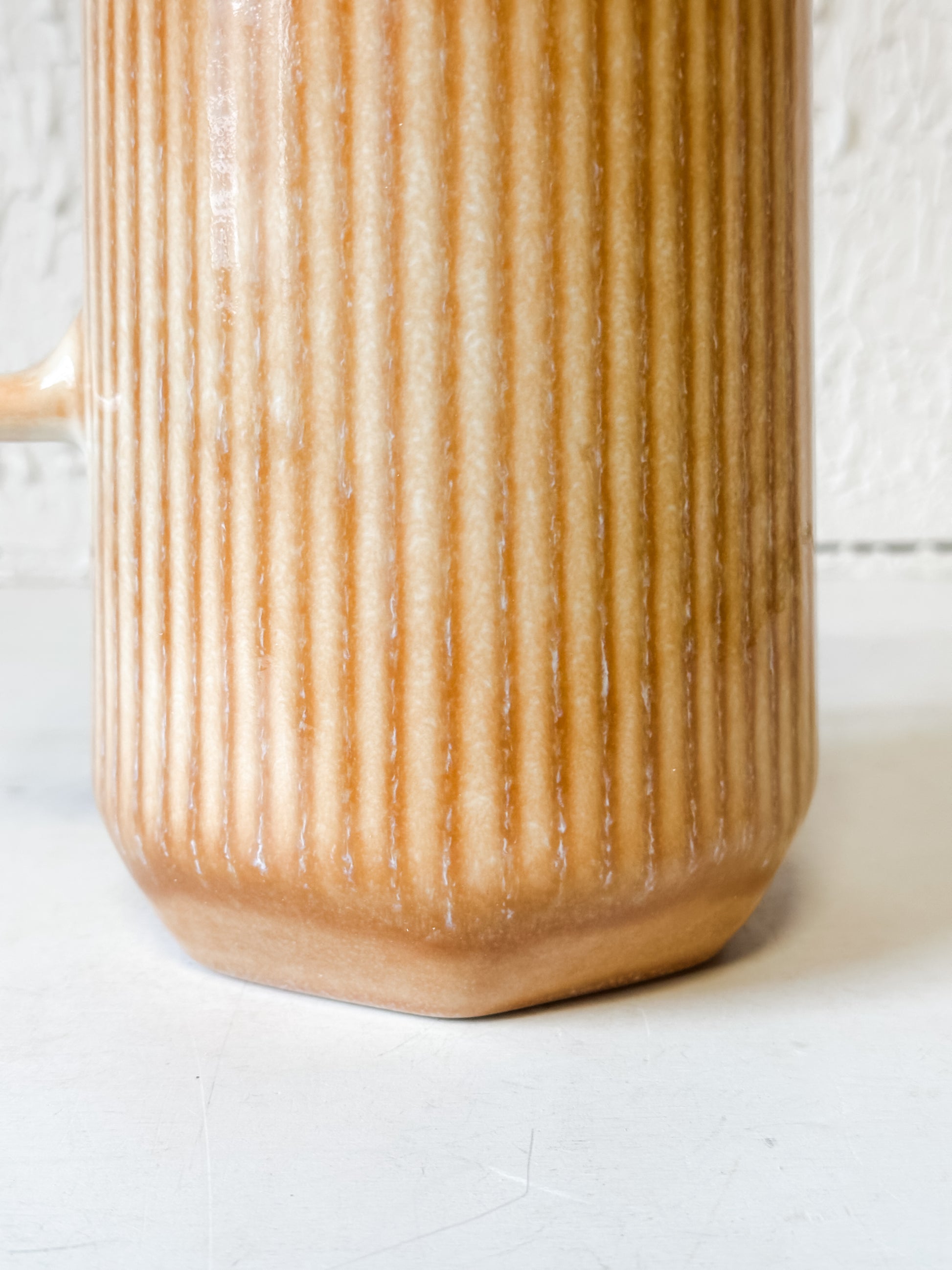 Artisan Apricot Ribbed Stoneware Pitcher at the Rustic Barn in Killingworth, CT