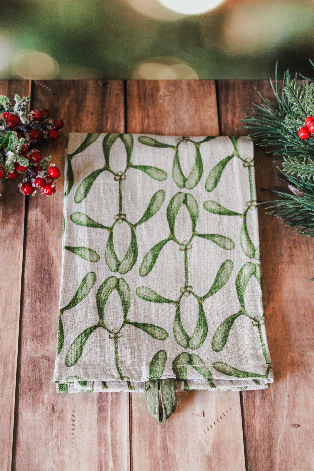 Artisan botanical christmas linen tea towels with floral holiday botanical designs for sale at the rustic barn in killingworth, CT