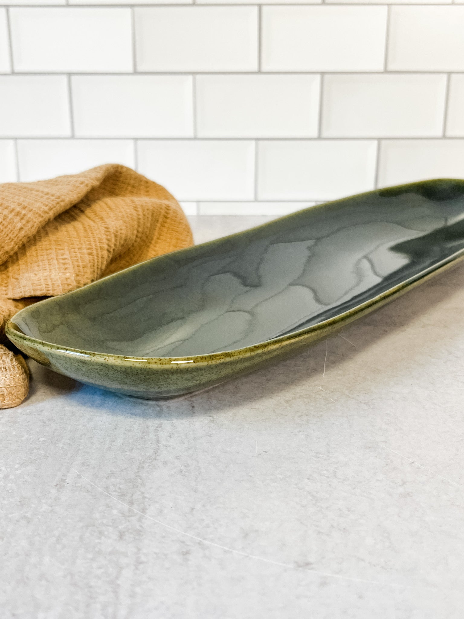 moss green platter with reactive glaze at the rustic barn in killingworth ct