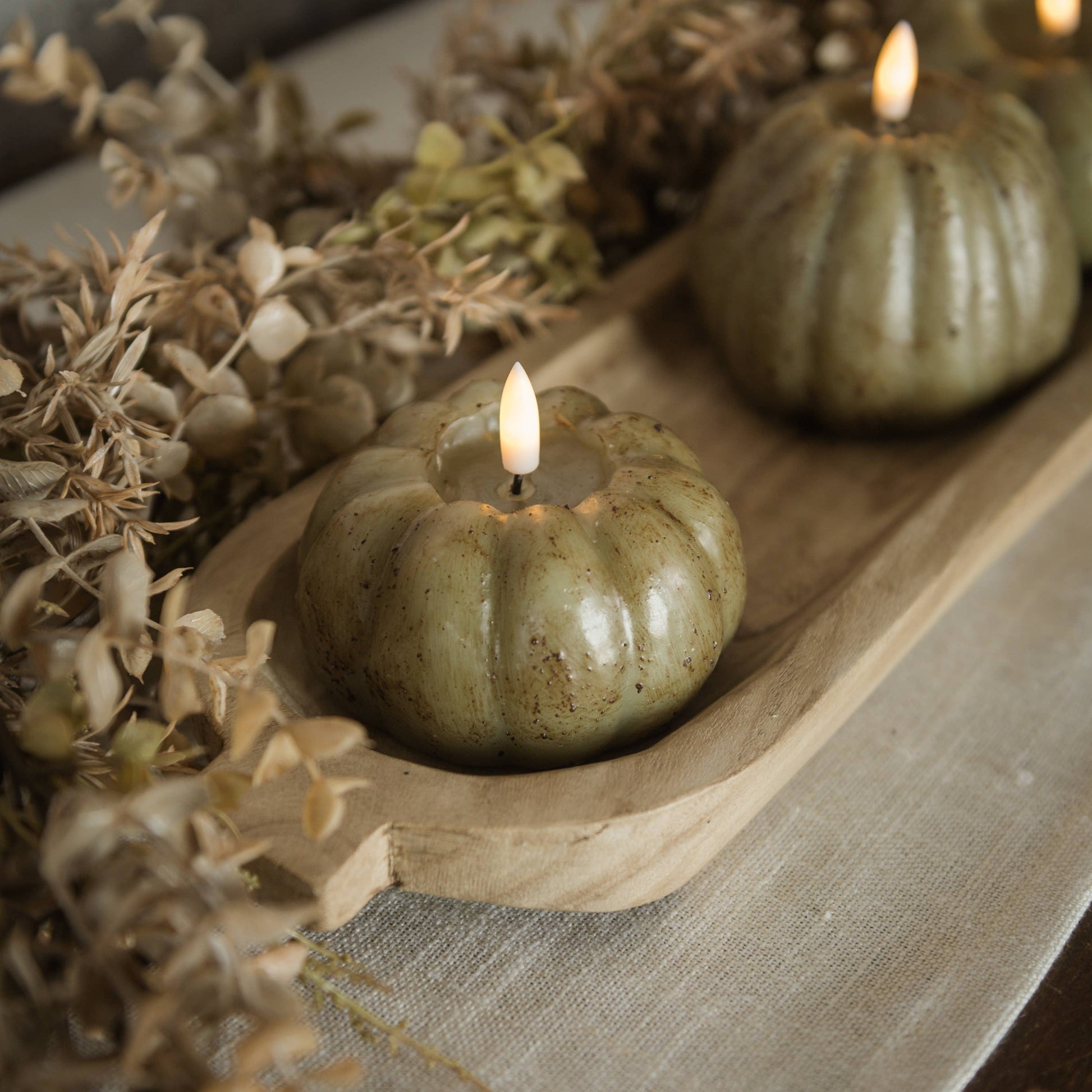 realistic faux 3d green flameless pumpkin candle at the rustic barn in killingworth ct