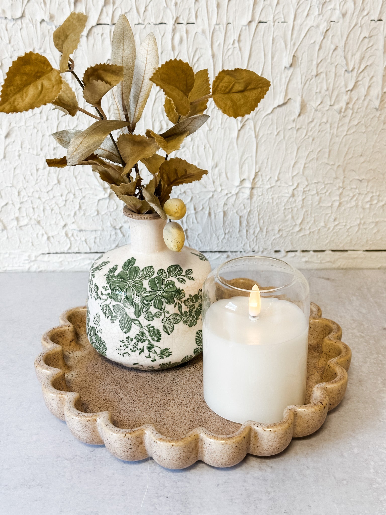 beige speckled ceramic scallop dish at the rustic barn in killingworth ct