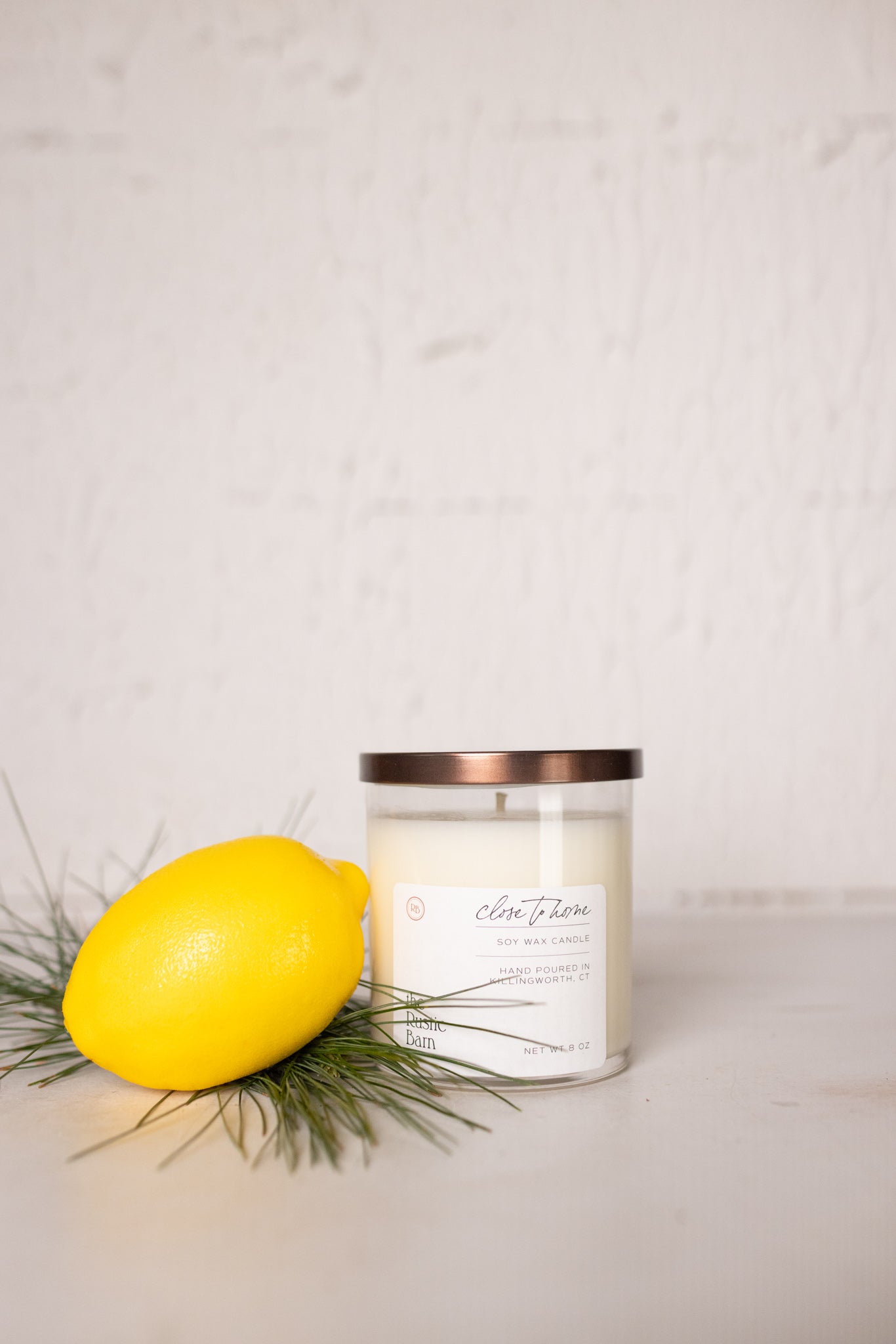 bergamot lemon and soft orange hand poured soy candle at the rustic barn in killingworth ct