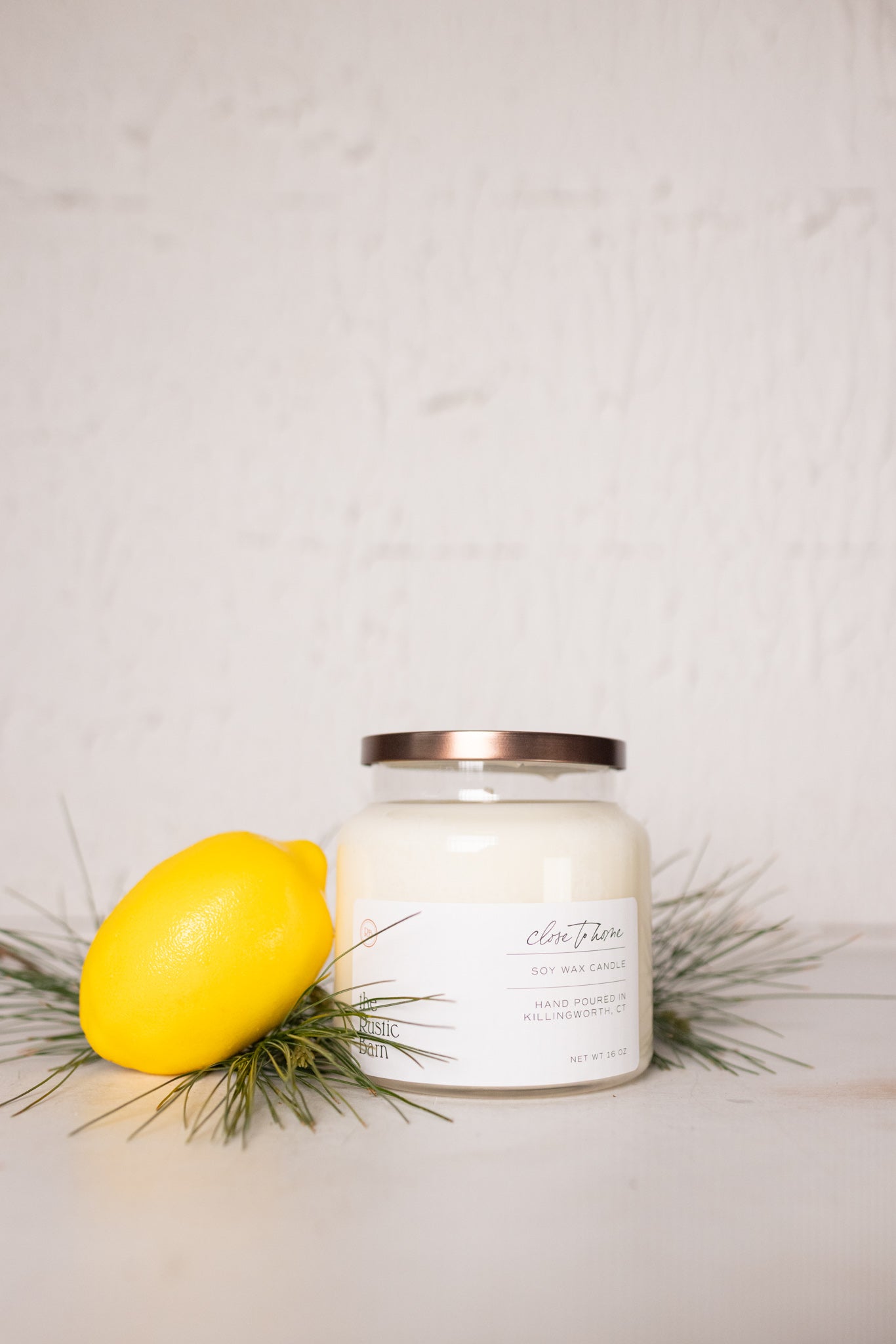 bergamot lemon and soft orange hand poured soy candle at the rustic barn in killingworth ct