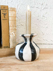 black and white striped ceramic taper holder at the rustic barn in killingworth ct
