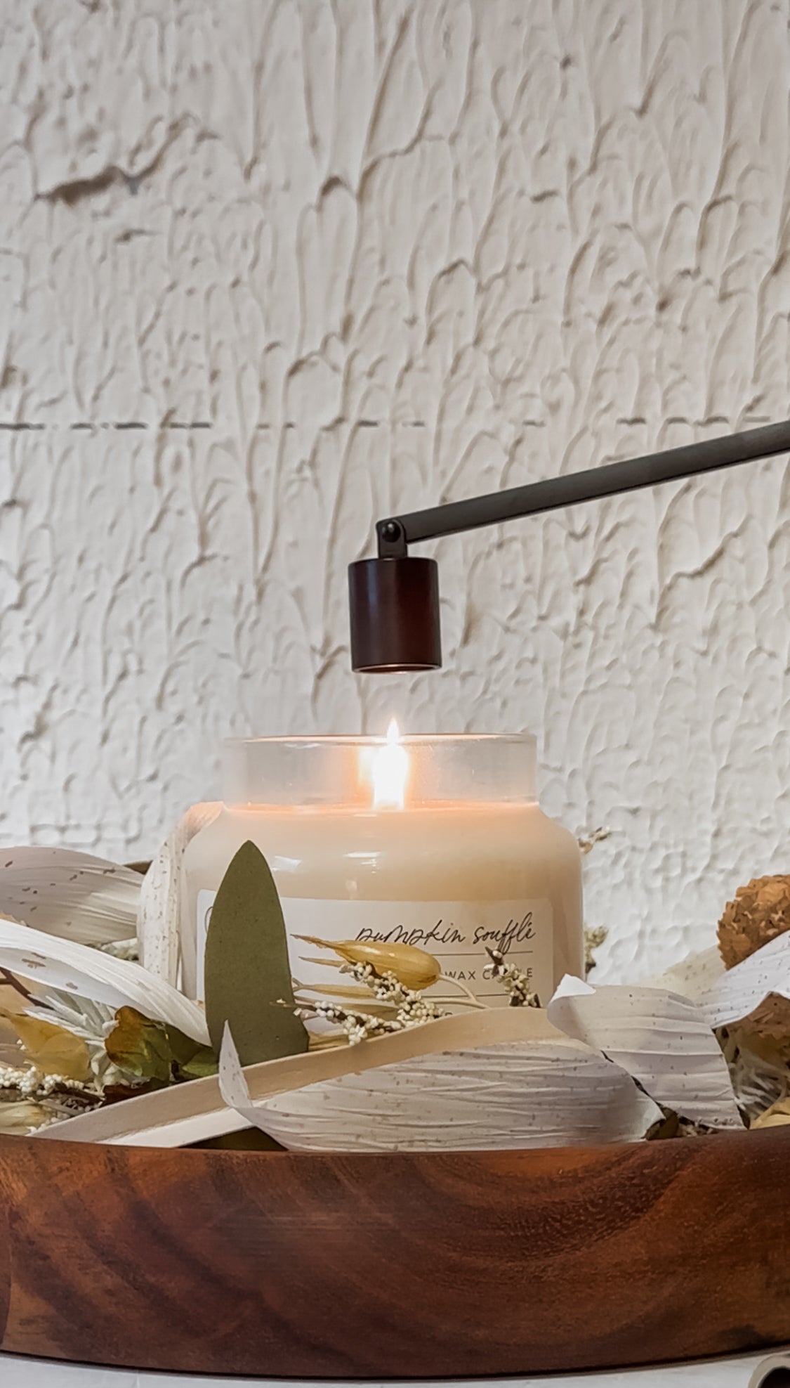 black metal candle snuffer at the Rustic Barn in Killingworth CT