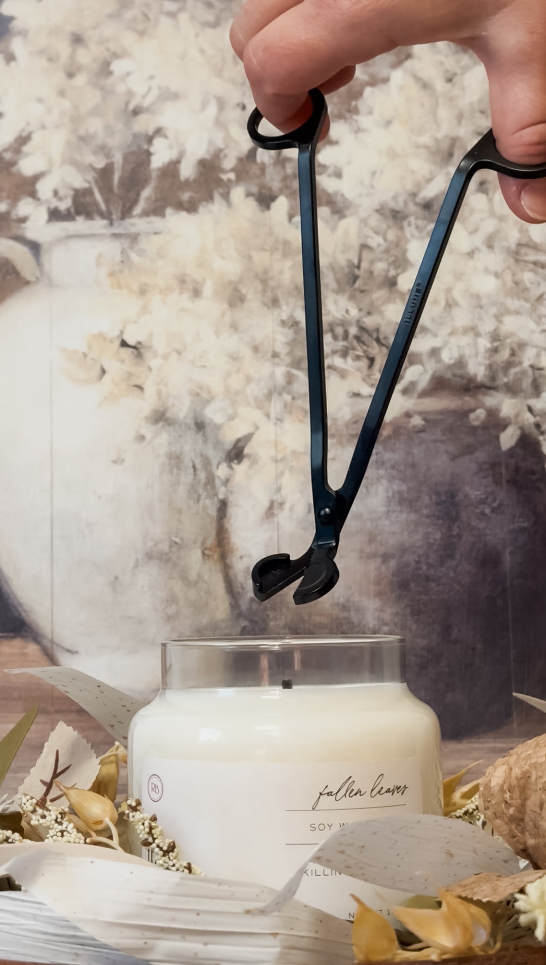 black metal candle wick trimmer at the Rustic Barn in Killingworth CT