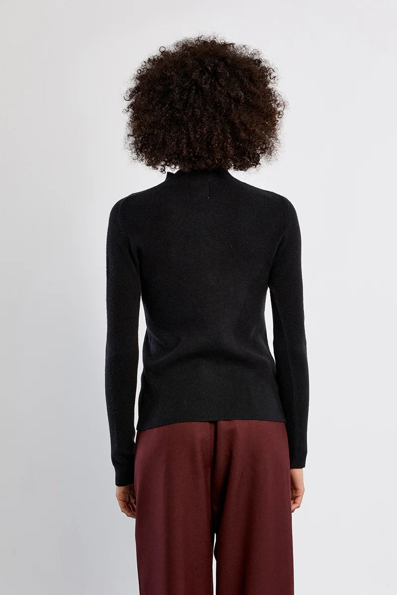 black turtleneck sock sweater with rhinestone down the middle at the rustic barn in killingworth ct