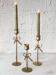 bow accent iron taper holders at the Rustic Barn in Killingworth, CT