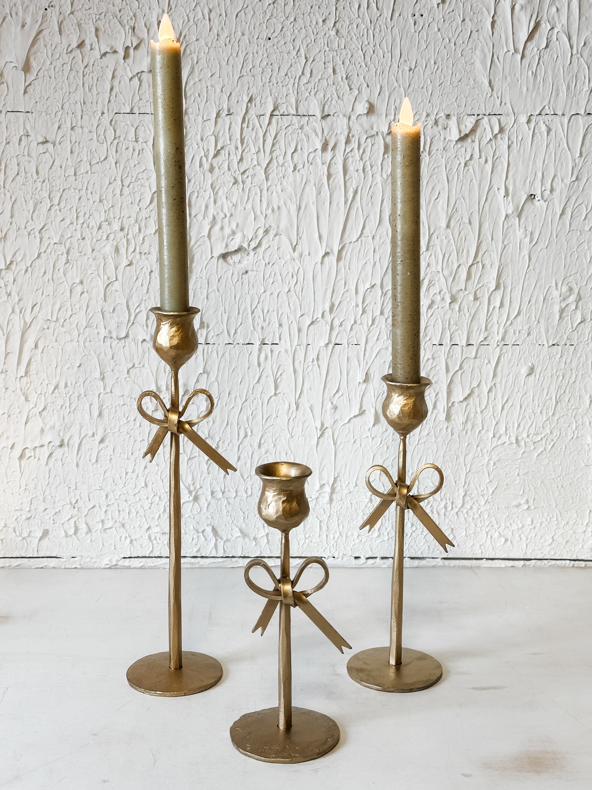 bow accent iron taper holders at the Rustic Barn in Killingworth, CT