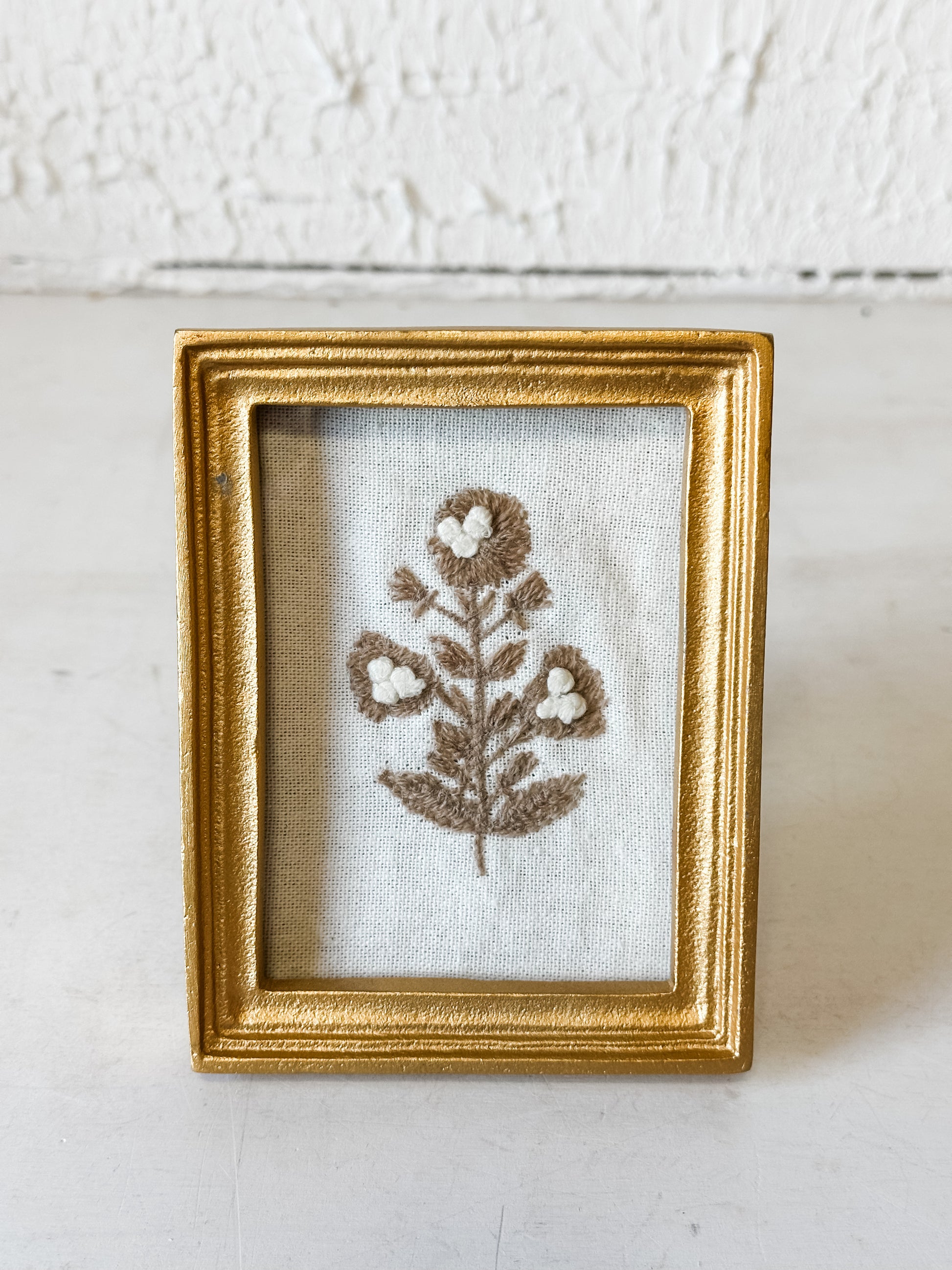 Brass Framed Embroidered Flower Art at the Rustic Barn in Killingworth, CT