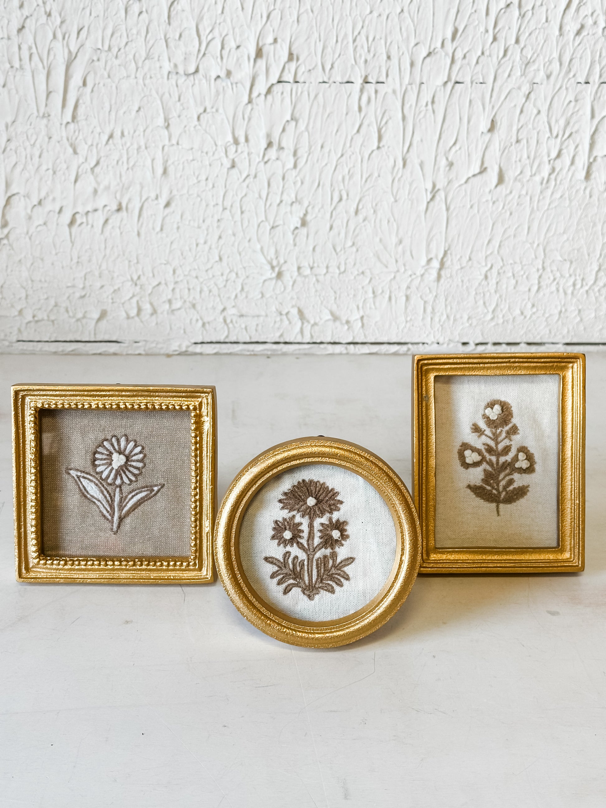 Brass Framed Embroidered Flower Art at the Rustic Barn in Killingworth, CT
