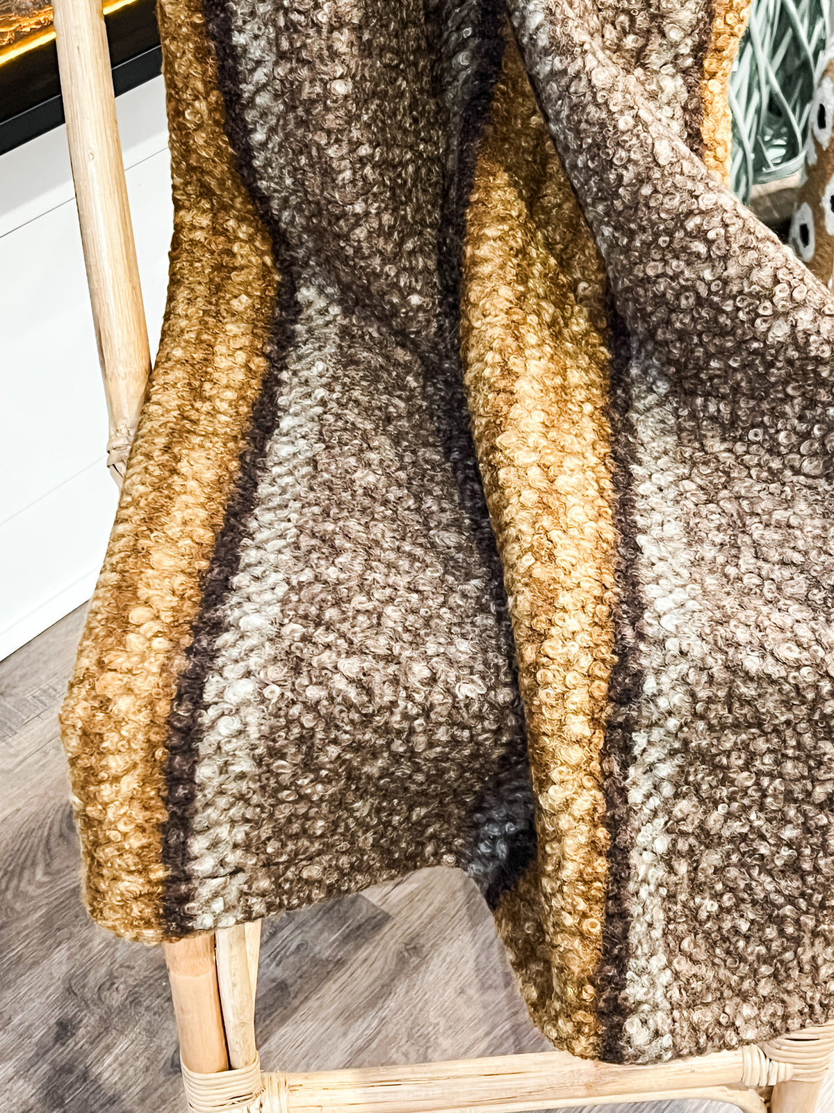 brown and gold faux sherpa throw at the rustic barn in killingworth ct