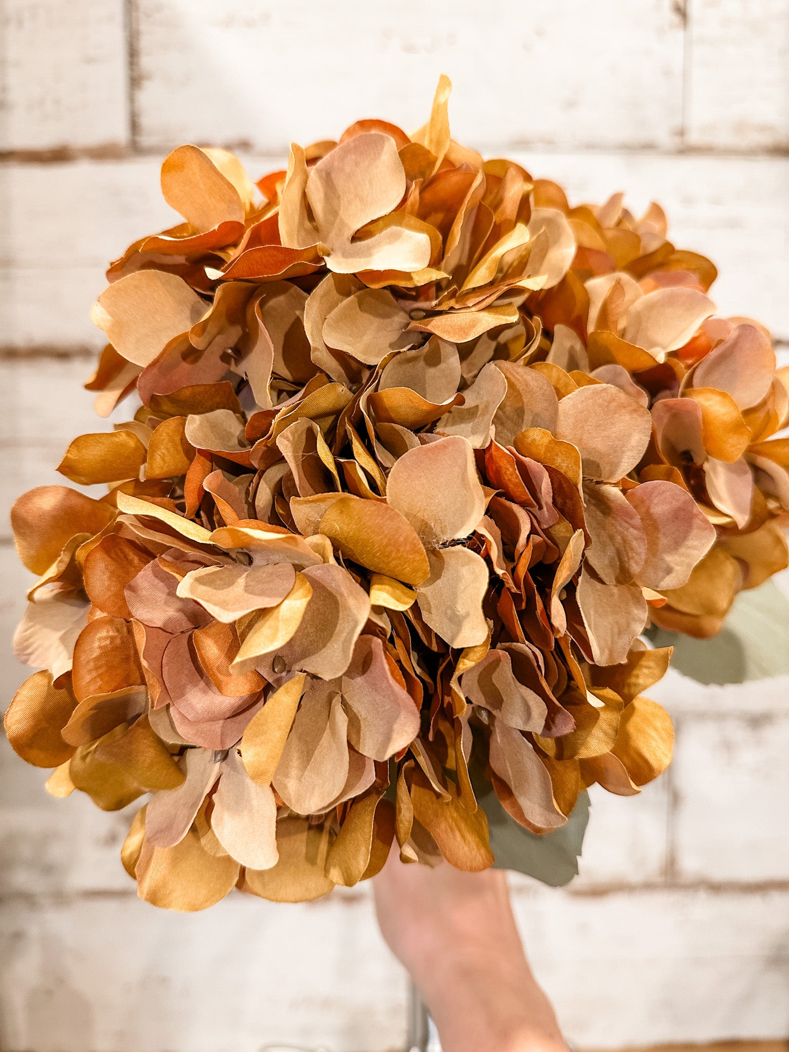burnt orange autumn faux hydrangea bush at the rustic barn in killingworth ct