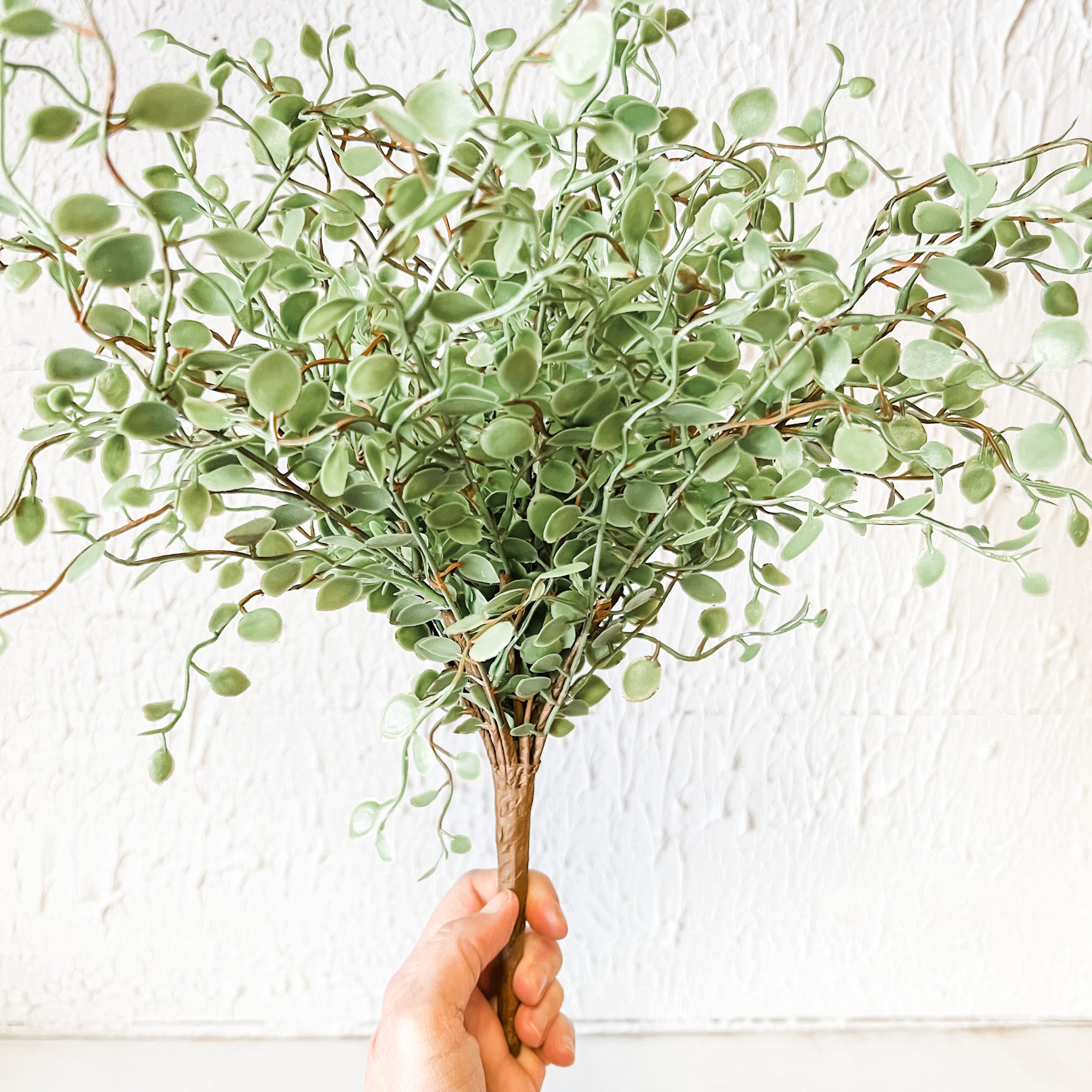 faux spring button leaf bush at the rustic barn in killingworth ct