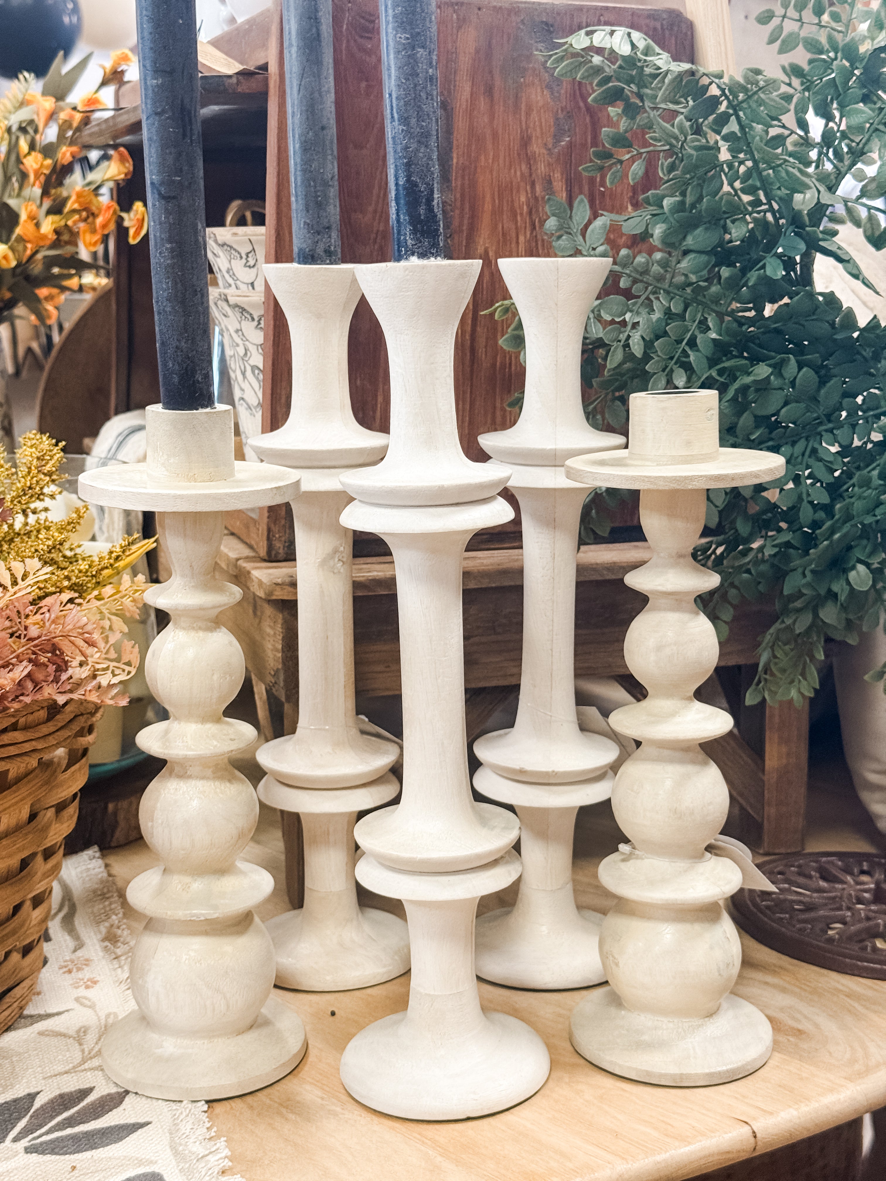 carved mango wood taper holders at The Rustic Barn in Killingworth CT