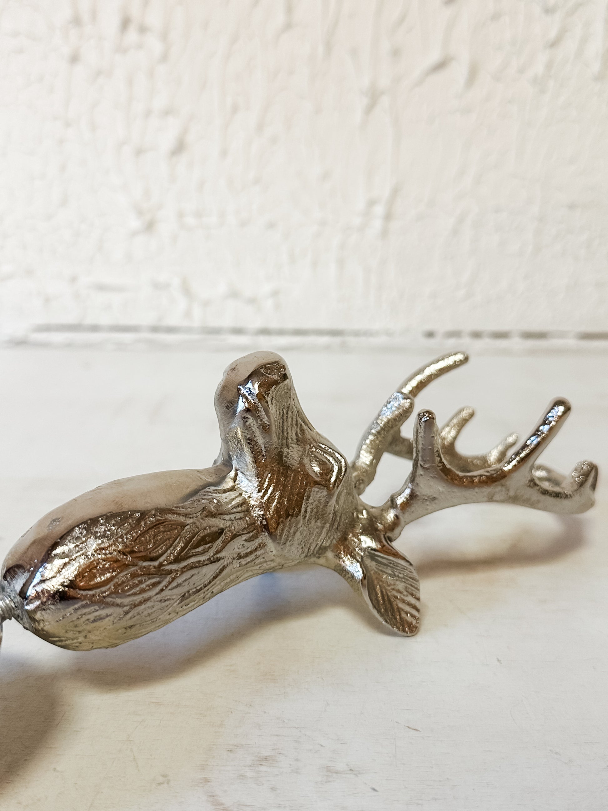 cast aluminum and stainless steel scoop with deer head shaped handle at The Rustic Barn in Killingworth CT