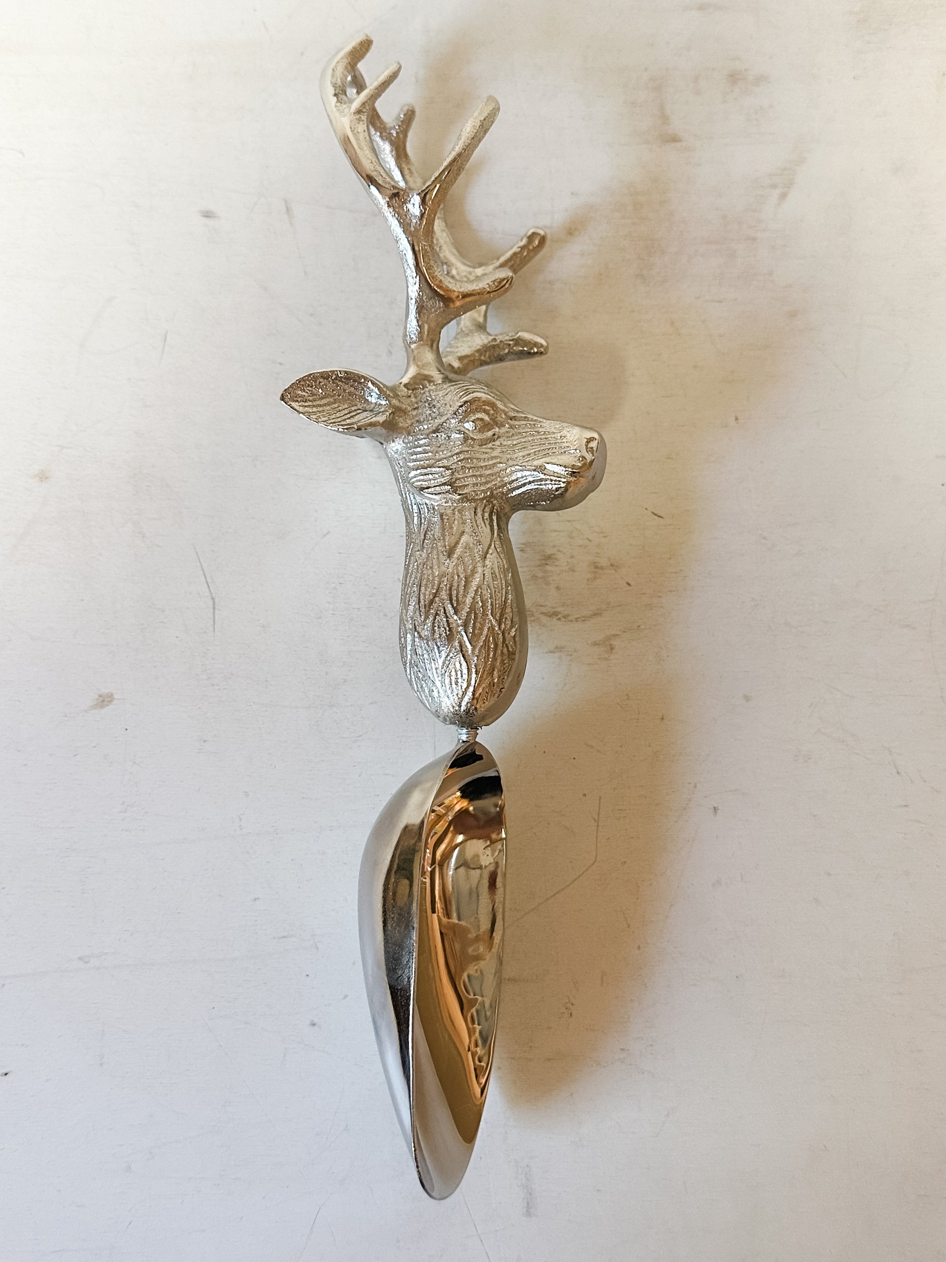 cast aluminum and stainless steel scoop with deer head shaped handle at The Rustic Barn in Killingworth CT