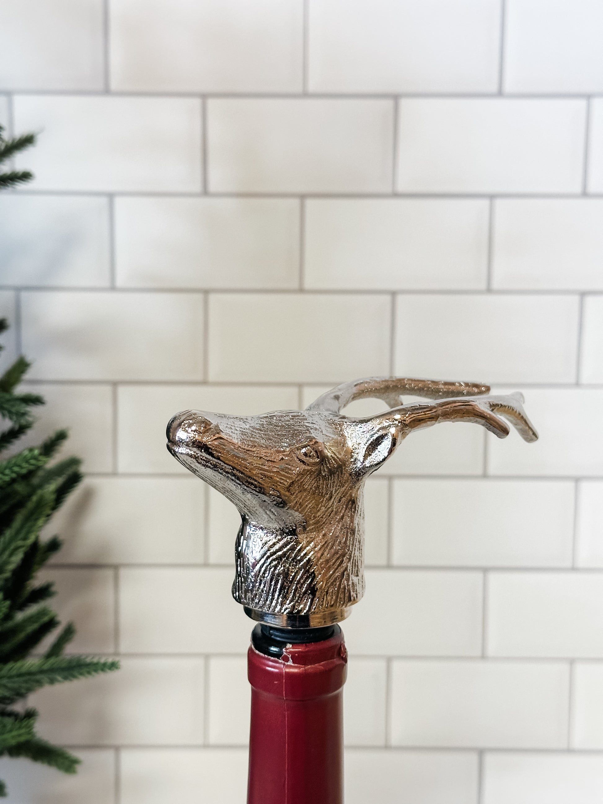 cast aluminum deer head bottle stopper at The Rustic Barn in Killingworth CT