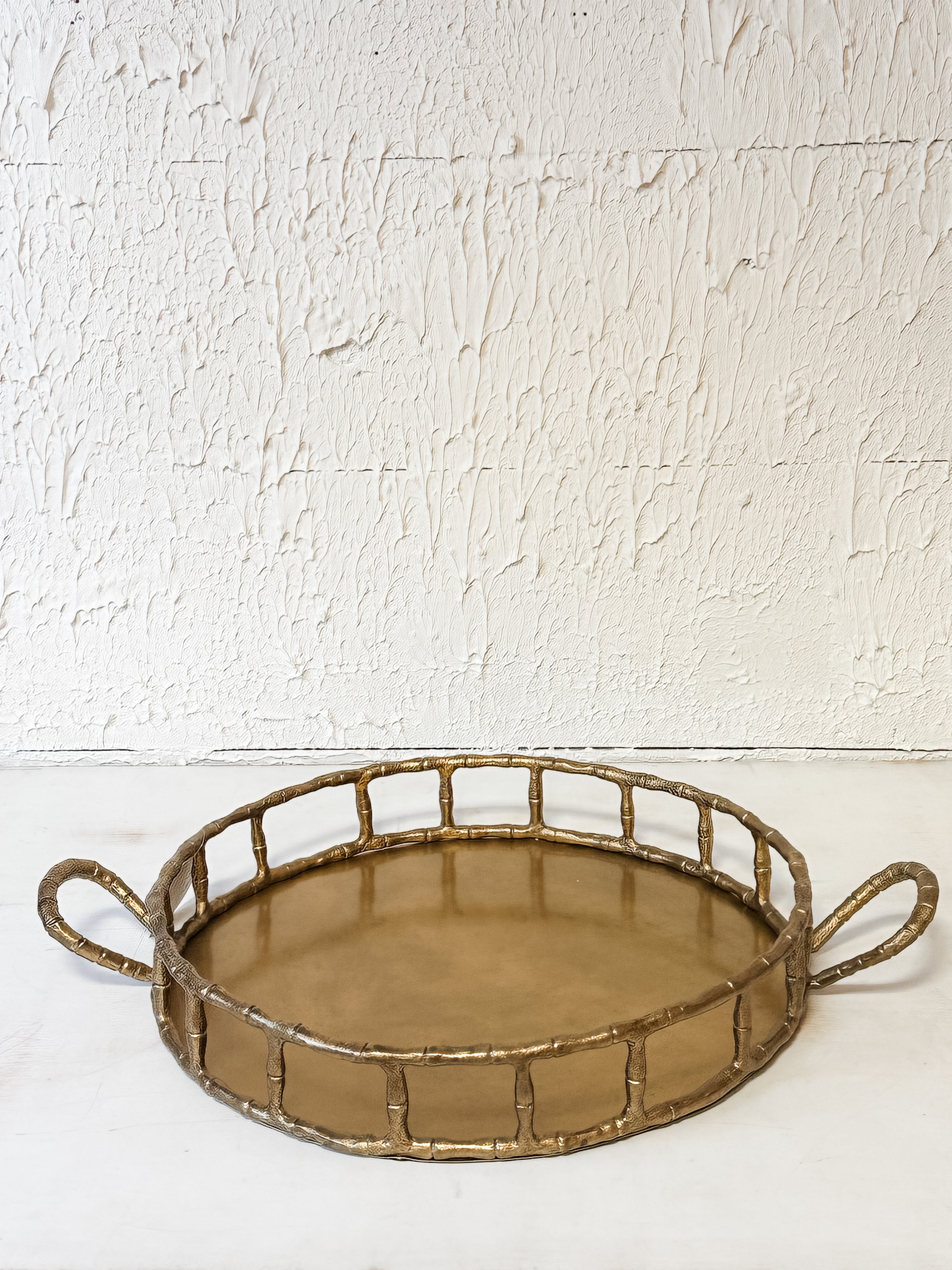 cast aluminum round tray with handles and brass finish at the Rustic Barn in Killingworth CT