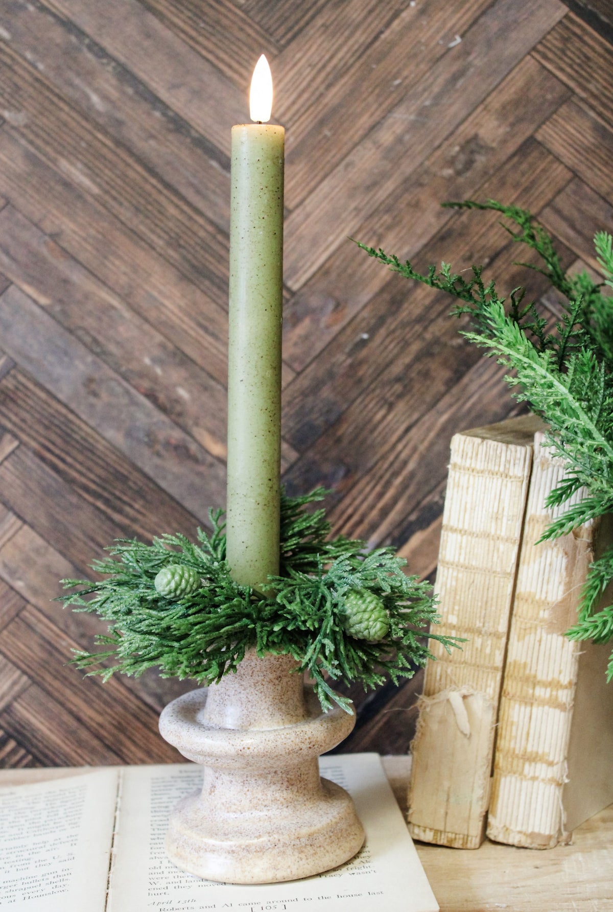 beautiful green cedar taper candle ring for christmas with green pinecone design for the holidays for sale at the rustic barn in killingworth, CT