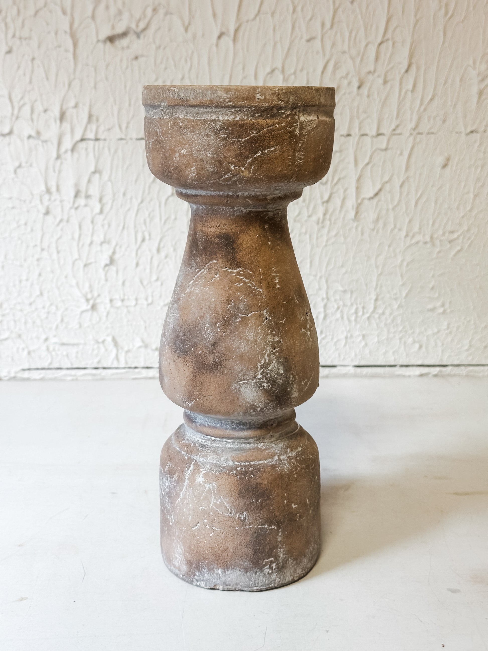 large terracotta pillar candle holders at the Rustic Barn in Killingworth CT 