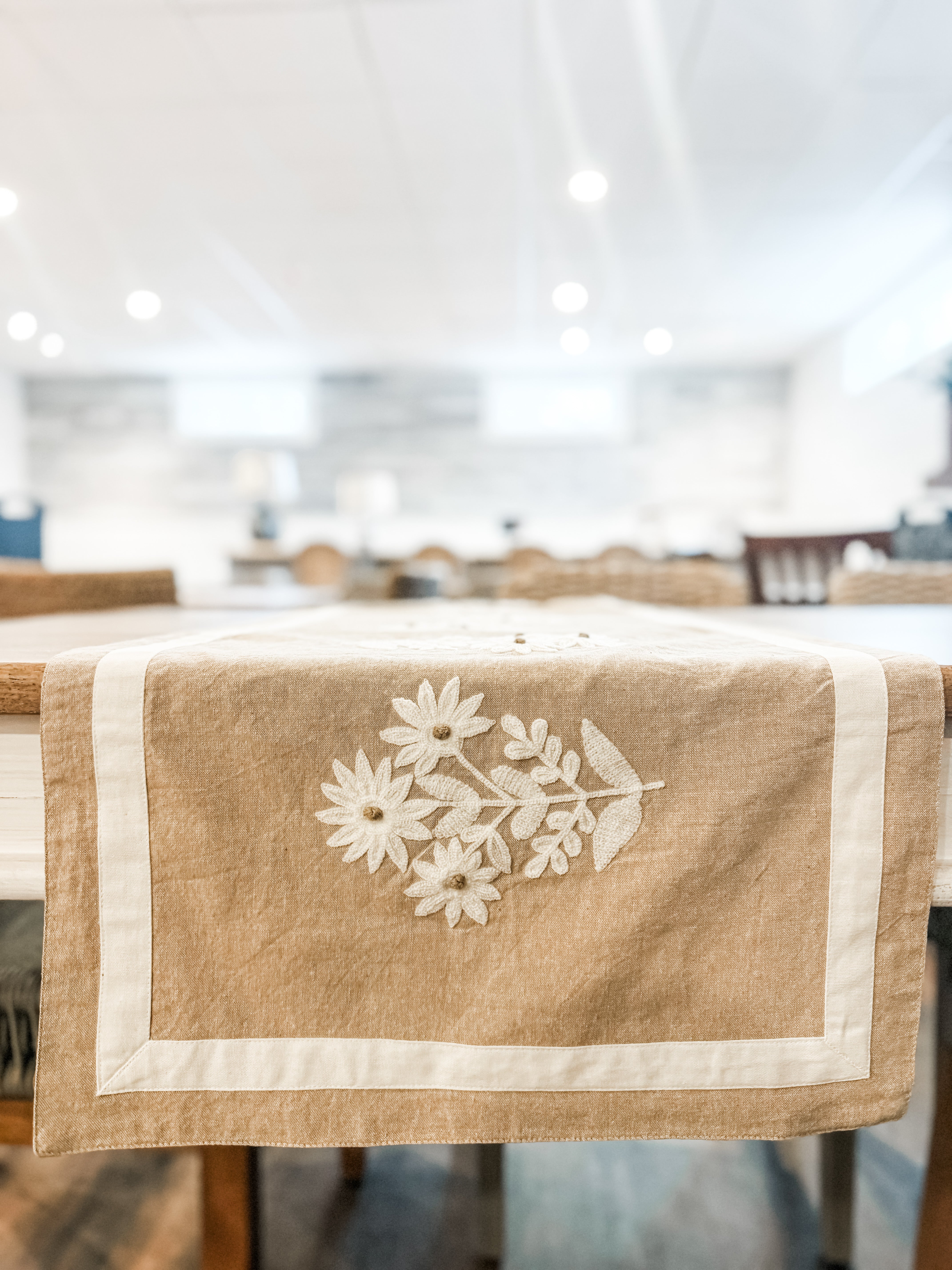 chambray and cream embroidered floral table runner at The Rustic Barn in Killingworth, CT